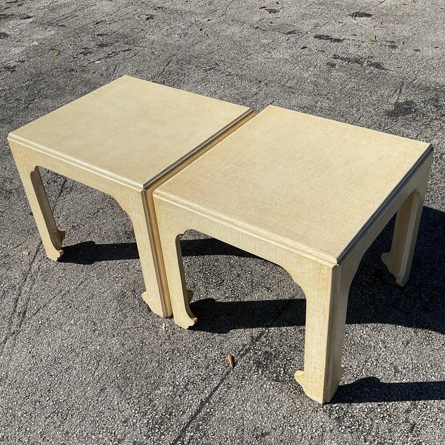Add a touch of classic sophistication to your space with this stunning pair of Regency-style crackle-finish side tables by Baker. Featuring timeless design, sturdy craftsmanship, and a rich patina, these tables make a perfect addition to any vintage