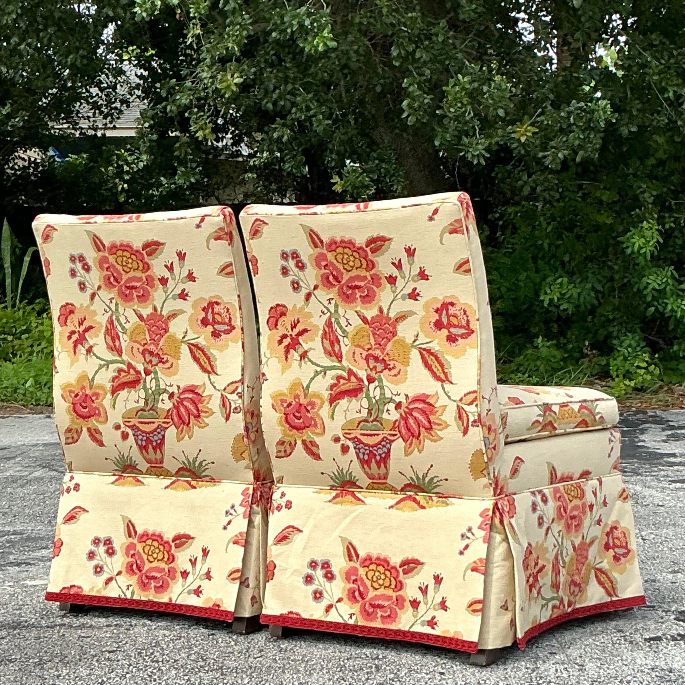 Elevate your interior with this stunning pair of Vintage Regency Baker Slipper Chairs. These elegant chairs feature the timeless sophistication of Regency design, with their sleek lines, arched backs, and luxurious upholstery. The low-profile
