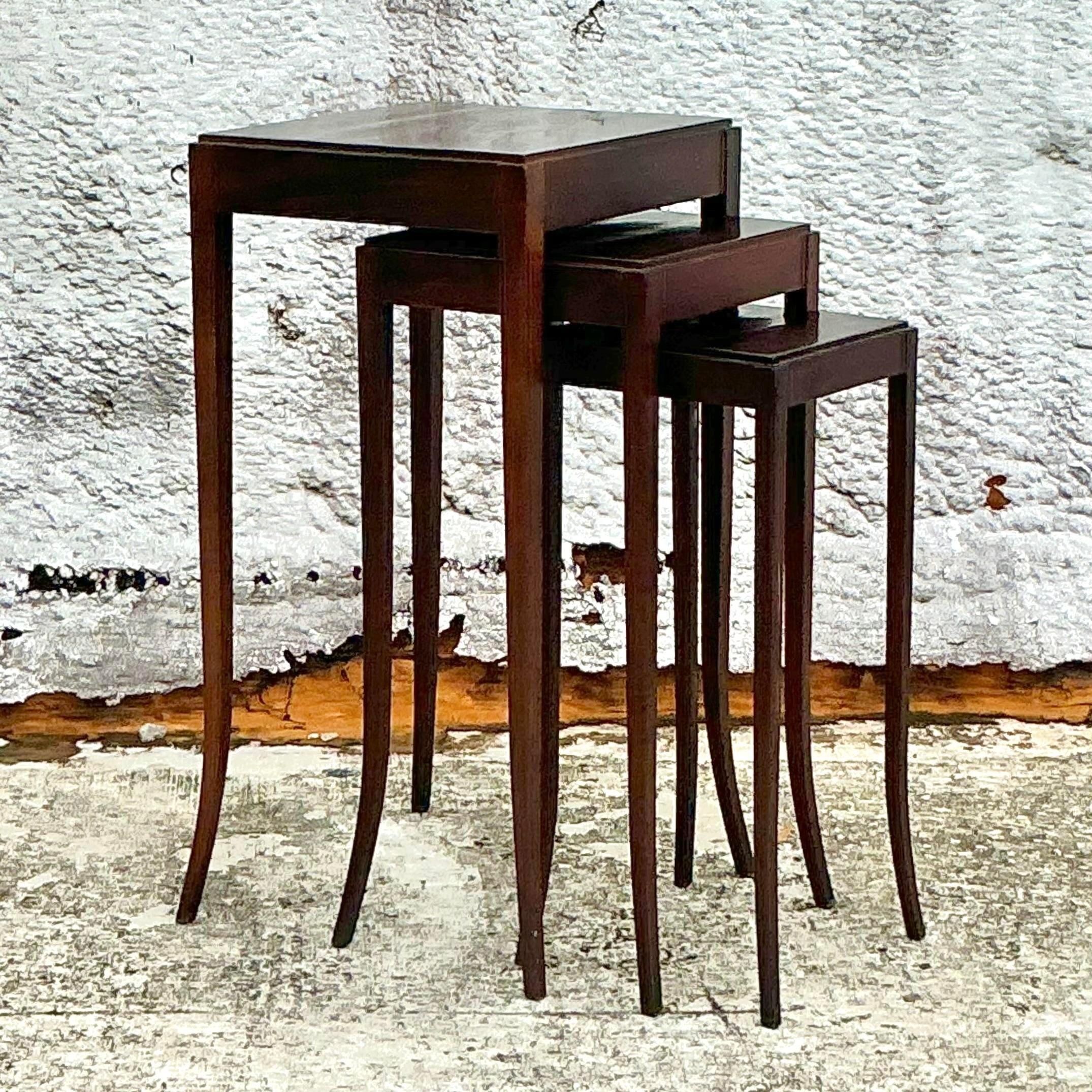 Elevate your decor with this sophisticated Vintage Regency Barbara Barry for Baker Nesting Table set. Known for her timeless elegance, Barbara Barry's design blends classic Regency style with modern refinement. Crafted for Baker, these nesting