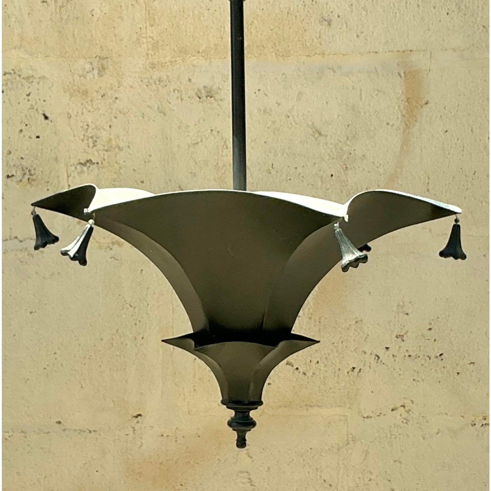 Elevate your interior with the architectural elegance of this striking vintage pagoda pendant. A quintessential example of Hollywood Regency design, this fixture boasts a dramatic, sculptural silhouette inspired by classic Chinoiserie motifs.