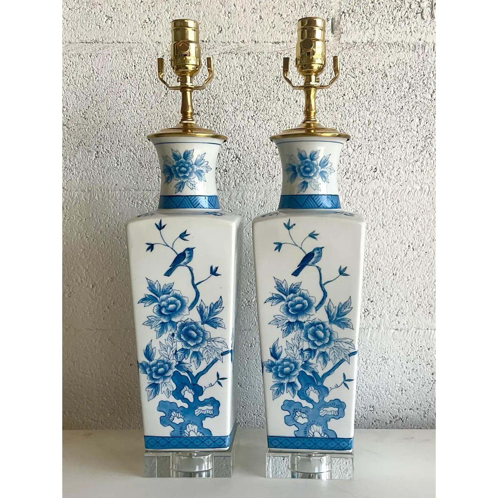 North American Vintage Regency Blue and White Chinoiserie Glazed Ceramic Lamps, a Pair
