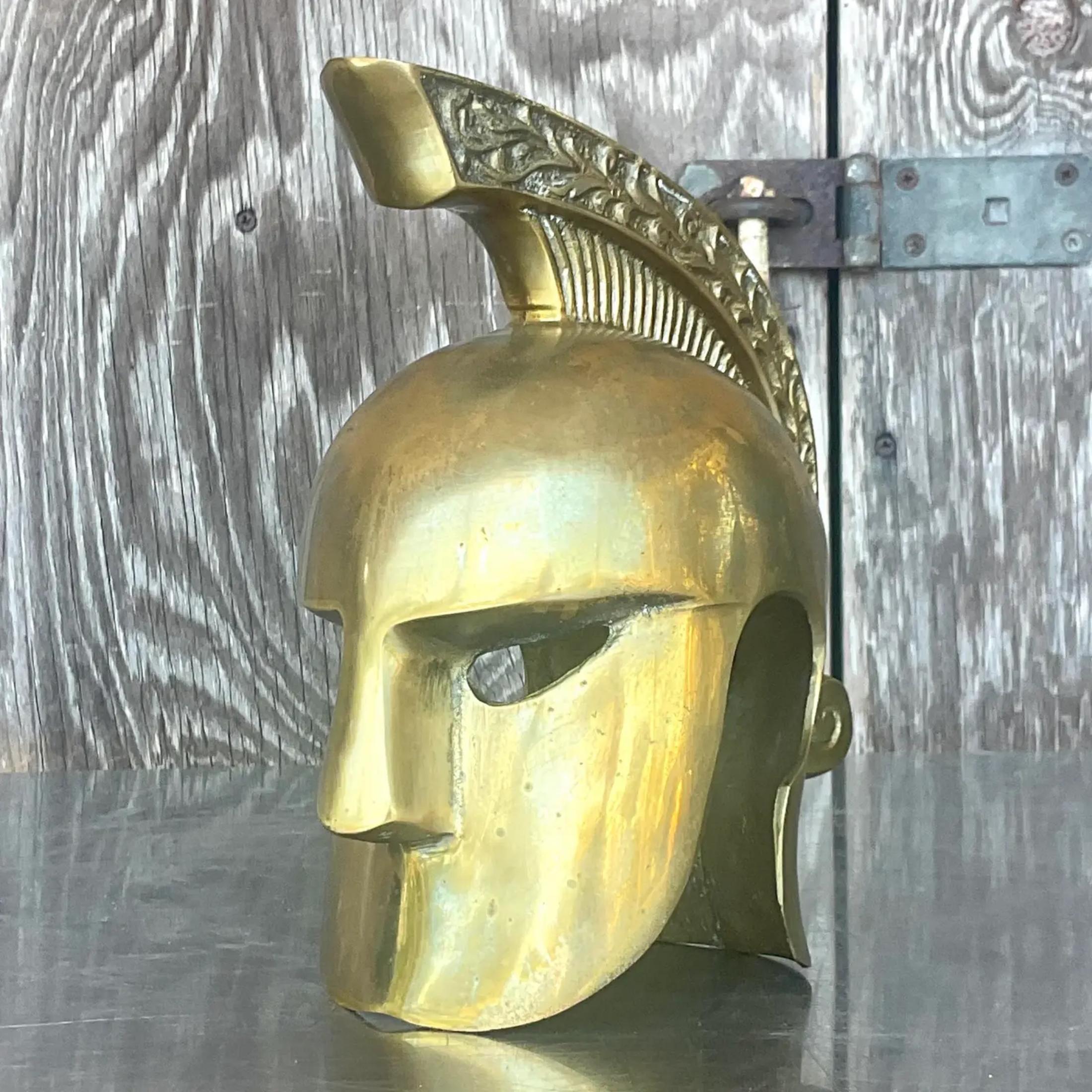 A fabulous vintage Coastal gladiator helmet. A chic little treasure in polished brass. Perfect for your coffee table, etagere or desk. You decide! Acquired from a Palm Beach estate.