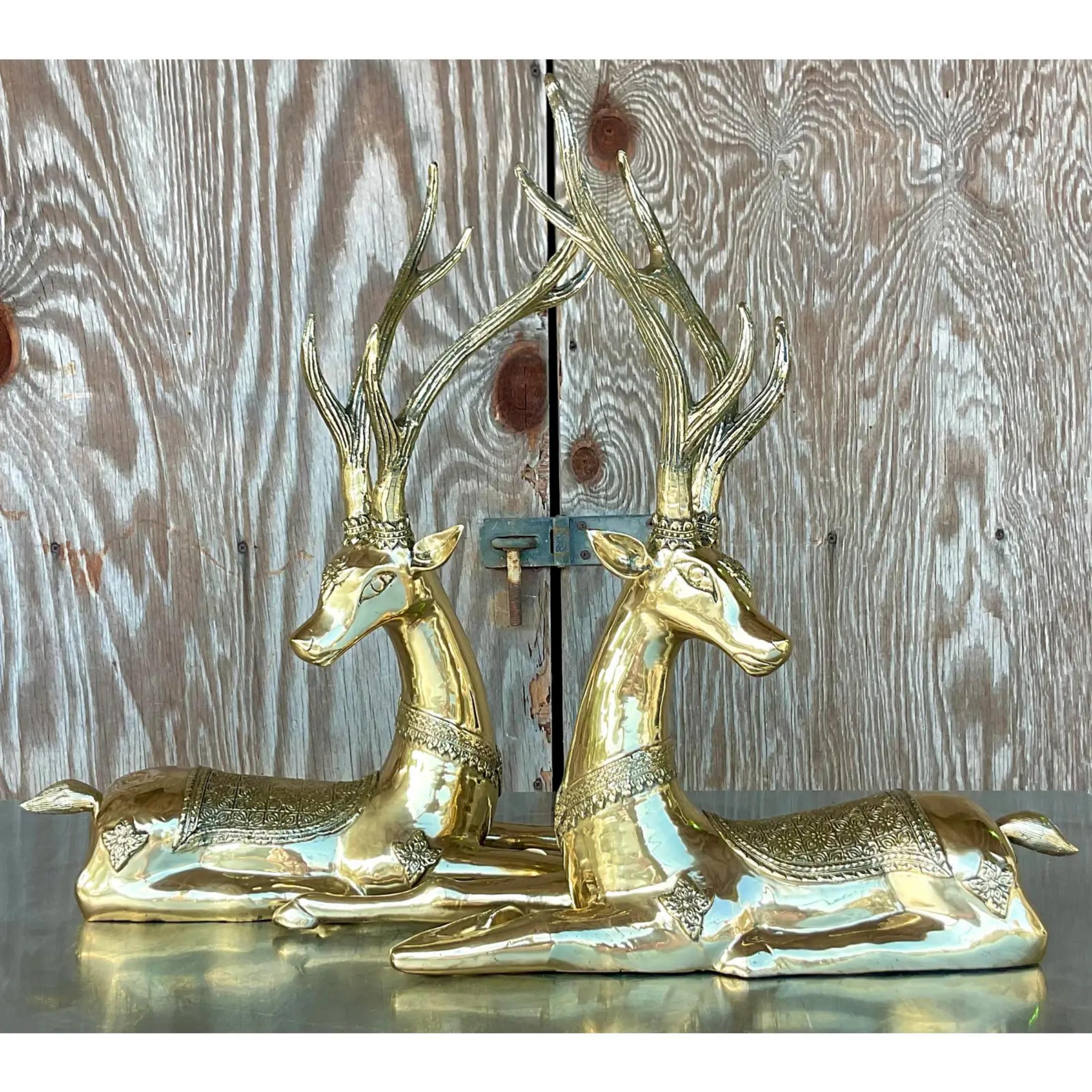 A fantastic vintage Regency pair of deer. Beautiful engraved couple with a heavy brass body. Acquired from a Palm Beach estate
