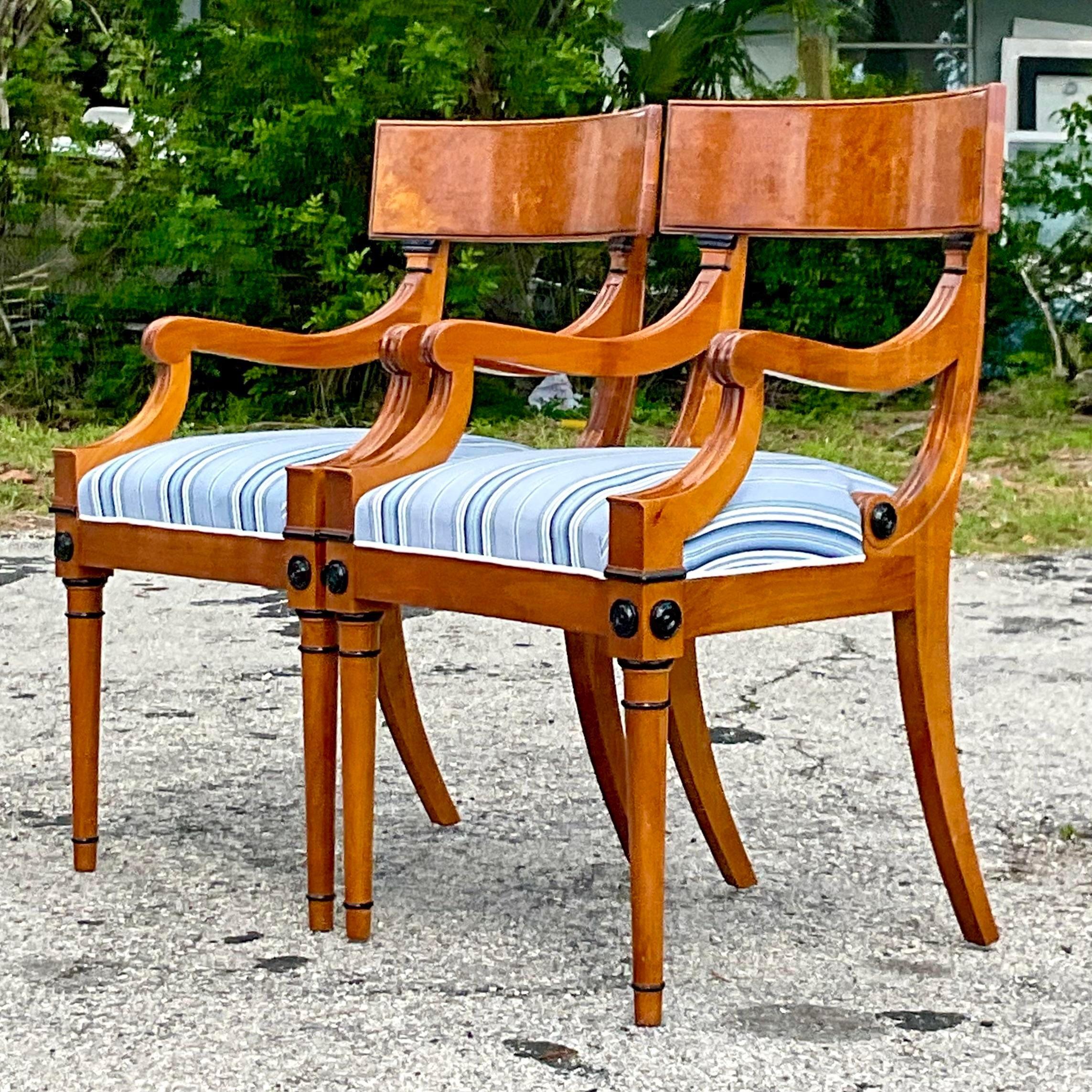 A fabulous pair of vintage Burl wood Klismos arm chairs. Done in the fabulous Biedermeier style. Gorgeous wood grain detail and Ralph Lauren striped upholstery. Acquired from a Palm Beach estate.