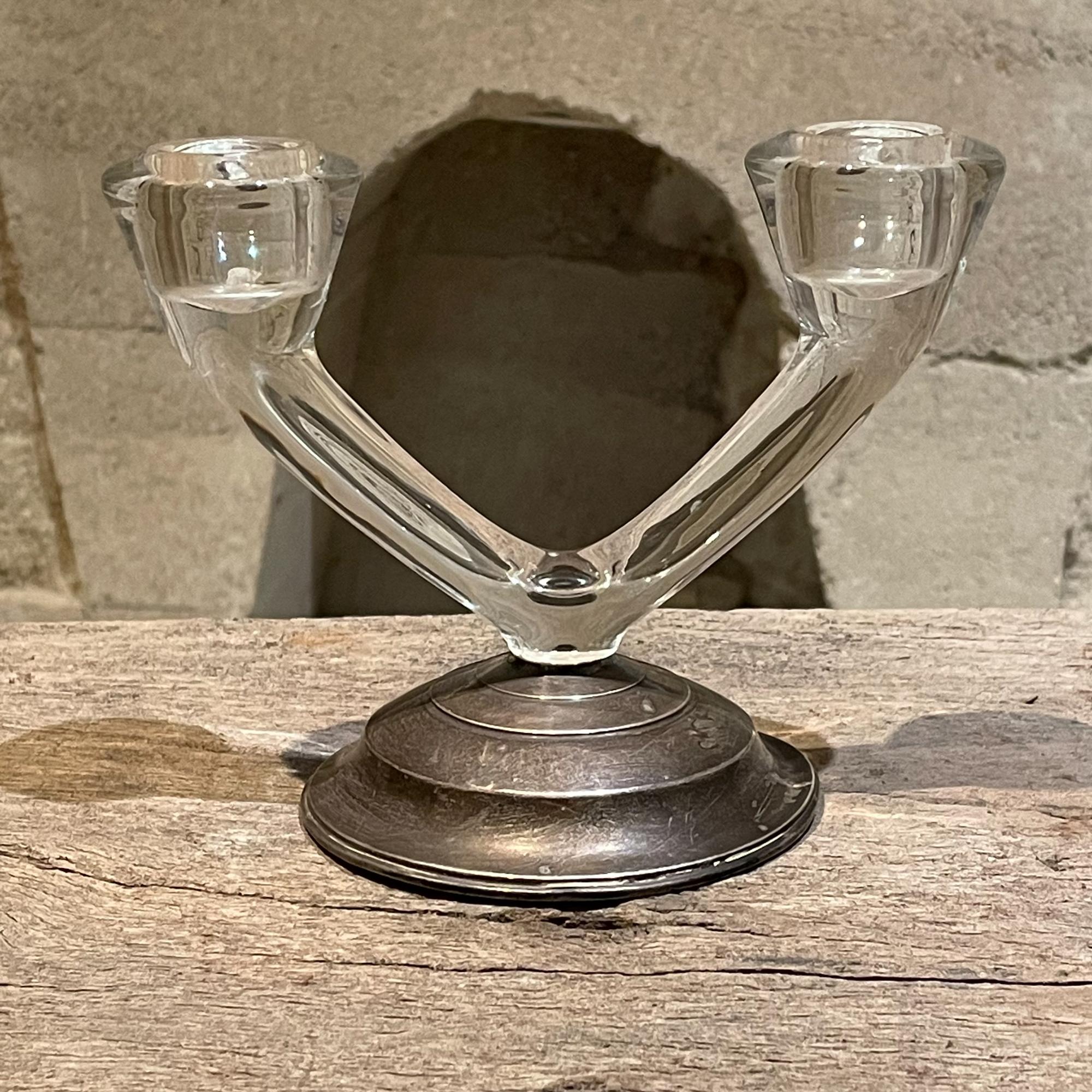 
Vintage Regency Two Arm Sterling Silver and Glass Candle Holder Candelabra by W M Rogers.
The base is made of sterling silver top section is made of glass.
Made in the USA 1960s.
5H x 6.25 W x 4 D.
Original vintage unrestored condition. Vintage