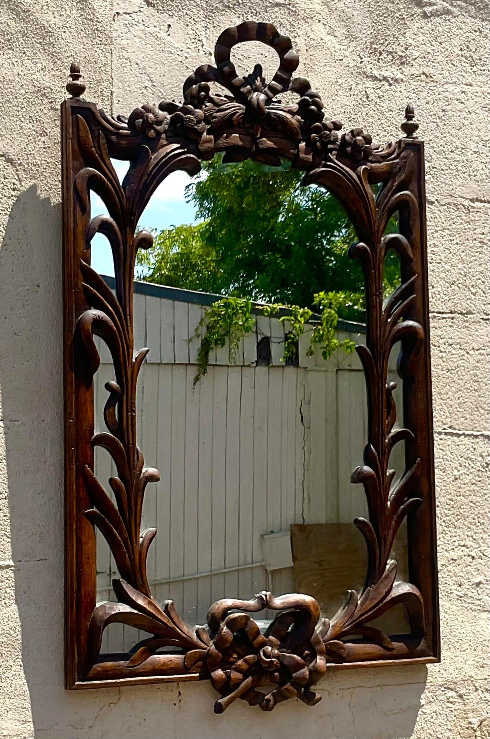 American Vintage Regency Carved Bow and Lily Mirror For Sale