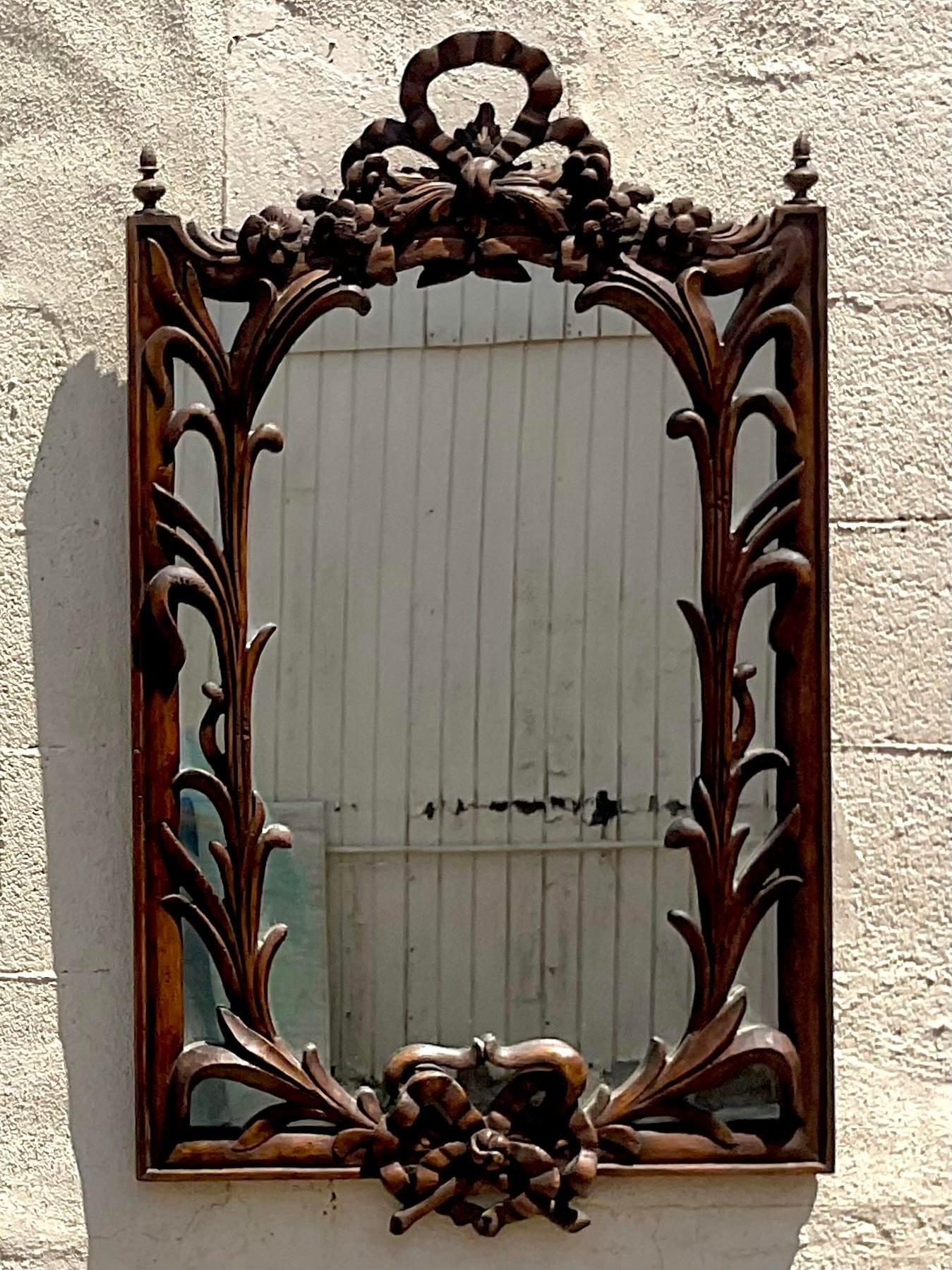 20th Century Vintage Regency Carved Bow and Lily Mirror For Sale