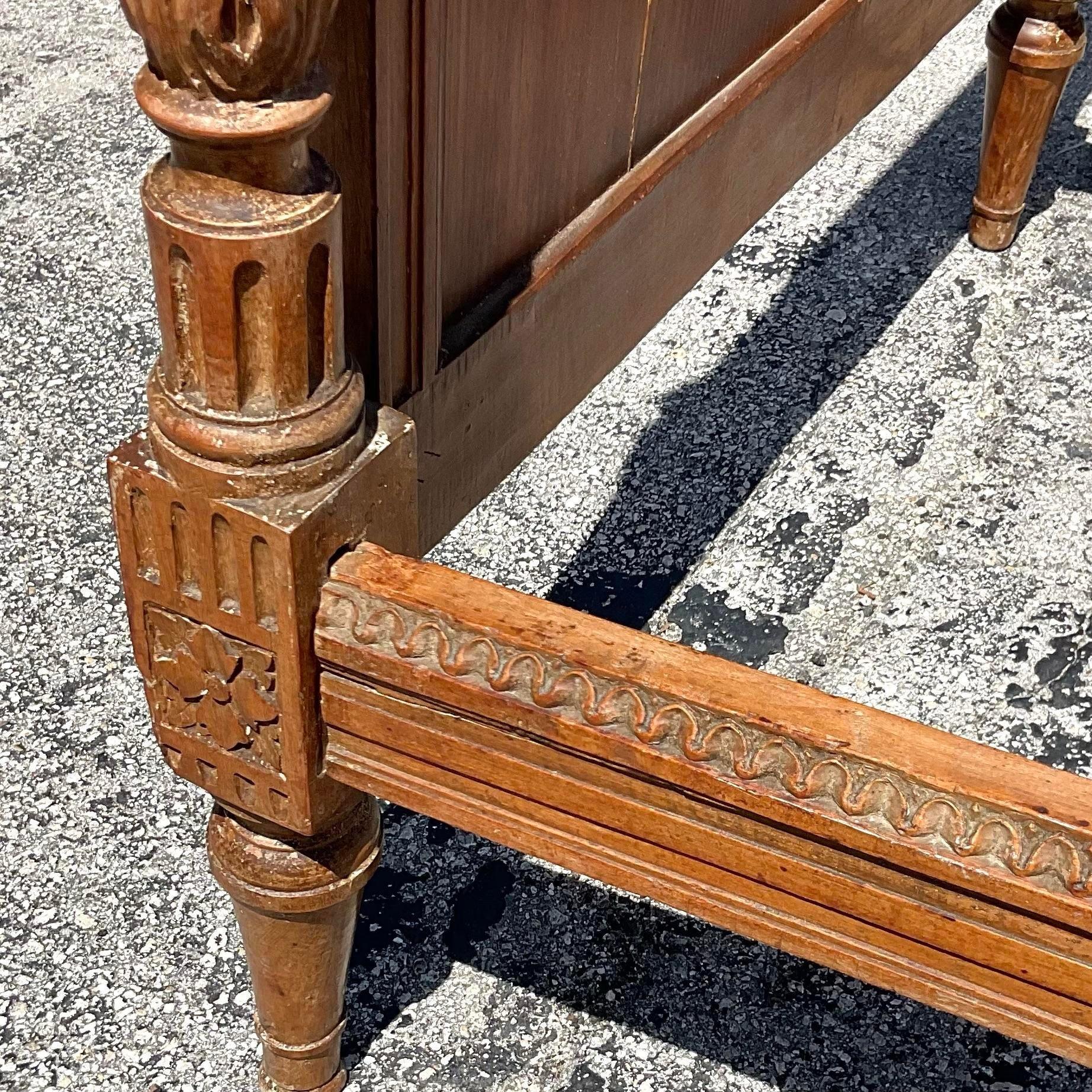 Embrace timeless elegance with our Vintage Regency Carved Wood Daybed, exquisitely crafted in quintessential American style. Elevate any space with its sophisticated design and unparalleled comfort, making it the epitome of refined relaxation