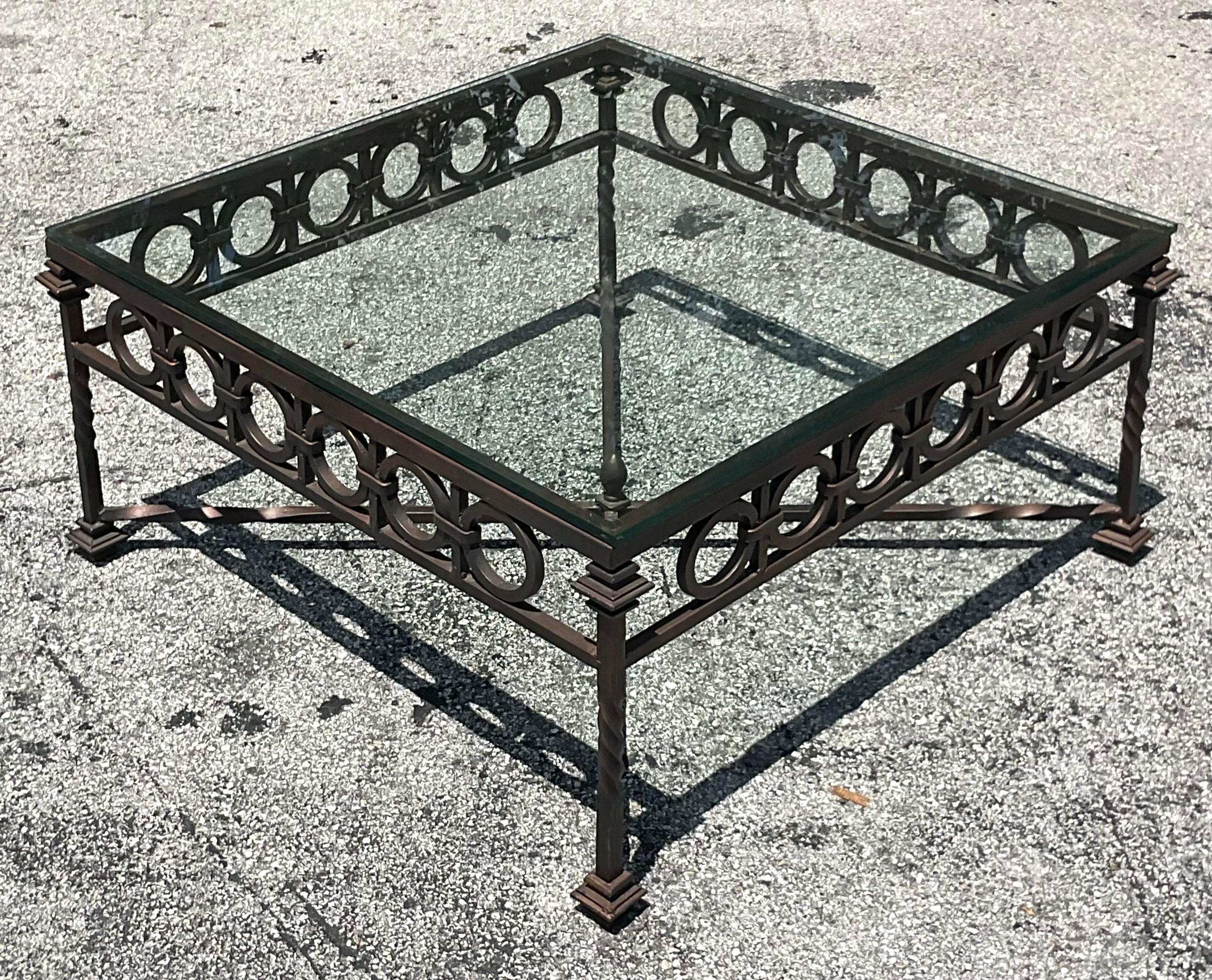 Bring a touch of vintage elegance to your living space with this Vintage Regency Cast Aluminum Coffee Table. Crafted with timeless American design in mind, its intricate detailing and durable construction evoke the grandeur of classic Regency style,