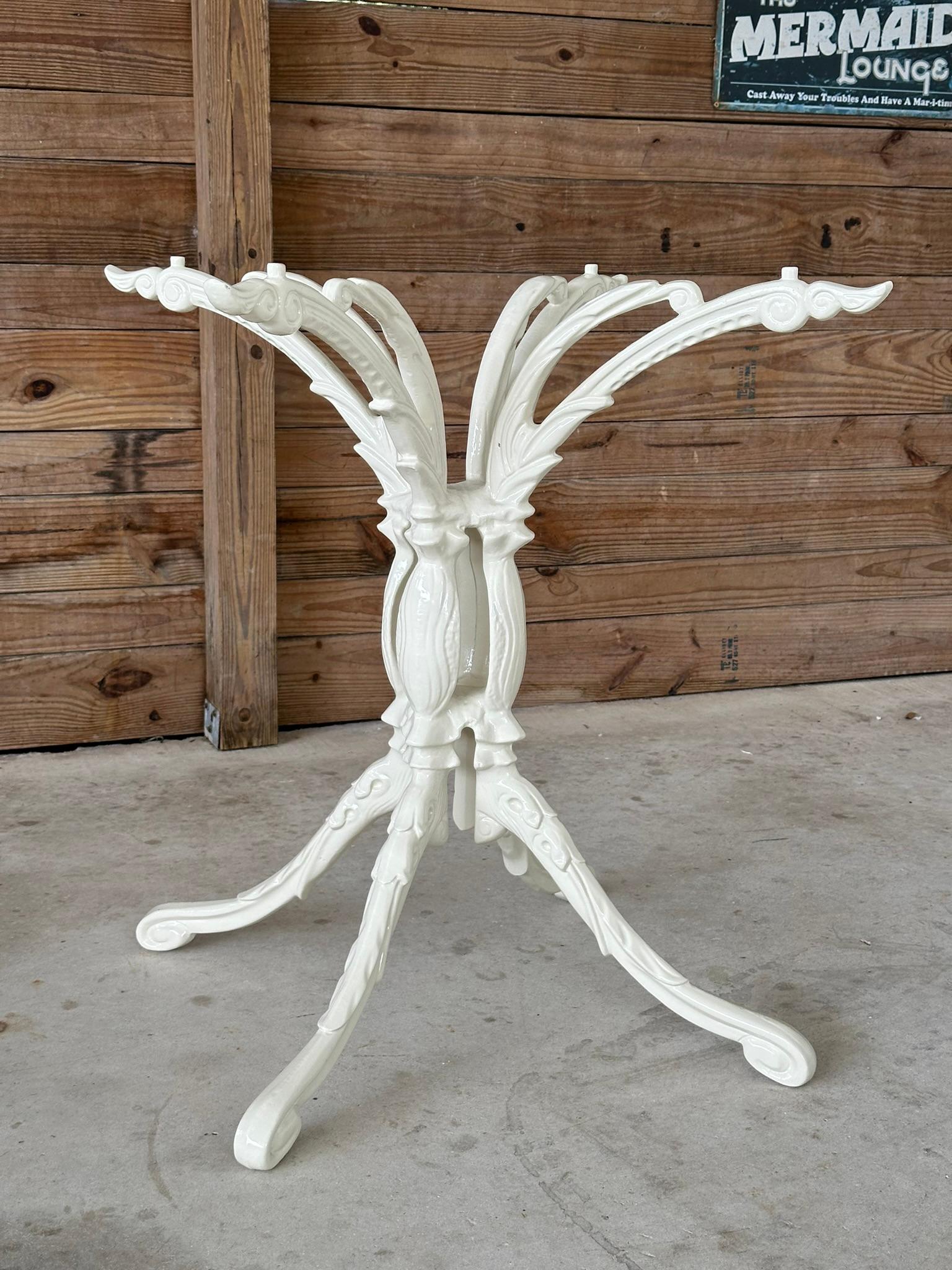 Introducing an elegant vintage cast aluminum outdoor dining table base, featuring intricate and stunning details that showcase its timeless design. This exquisite piece has been meticulously powder-coated in an Oyster off-white finish, enhancing its