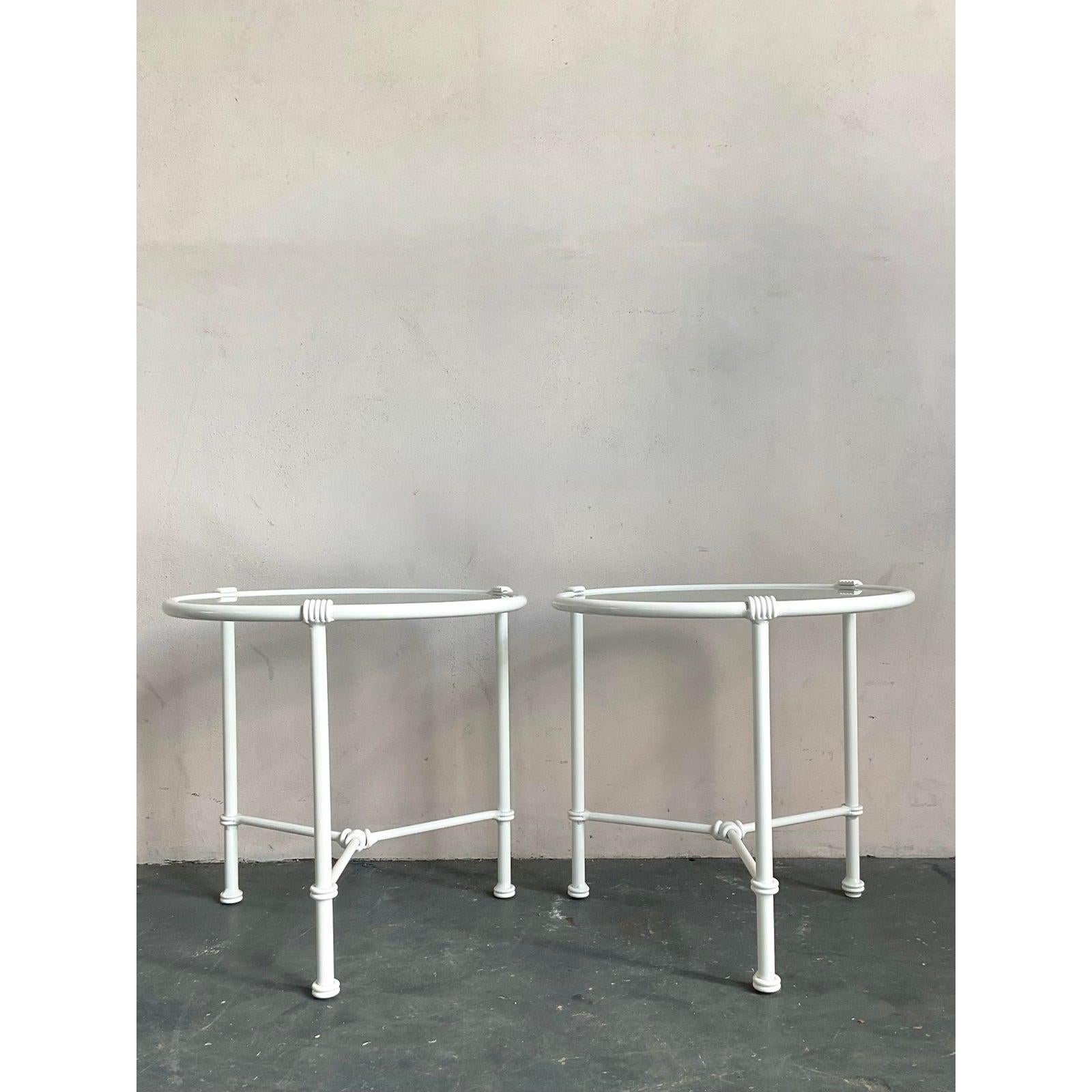 Presenting an enchanting pair of Vintage Regency Cast Aluminum Scroll Side Tables, perfect for adding a touch of classic elegance to any outdoor or indoor setting. These tables showcase an exquisite design, featuring graceful scrollwork meticulously