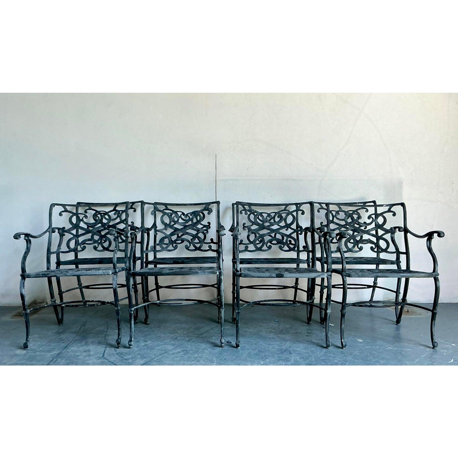 A captivating addition to any dining space or garden patio, this set of eight vintage Regency-style dining chairs exudes timeless elegance. Crafted from durable cast aluminum, these chairs feature an intricate scrollwork backrest, a signature of the