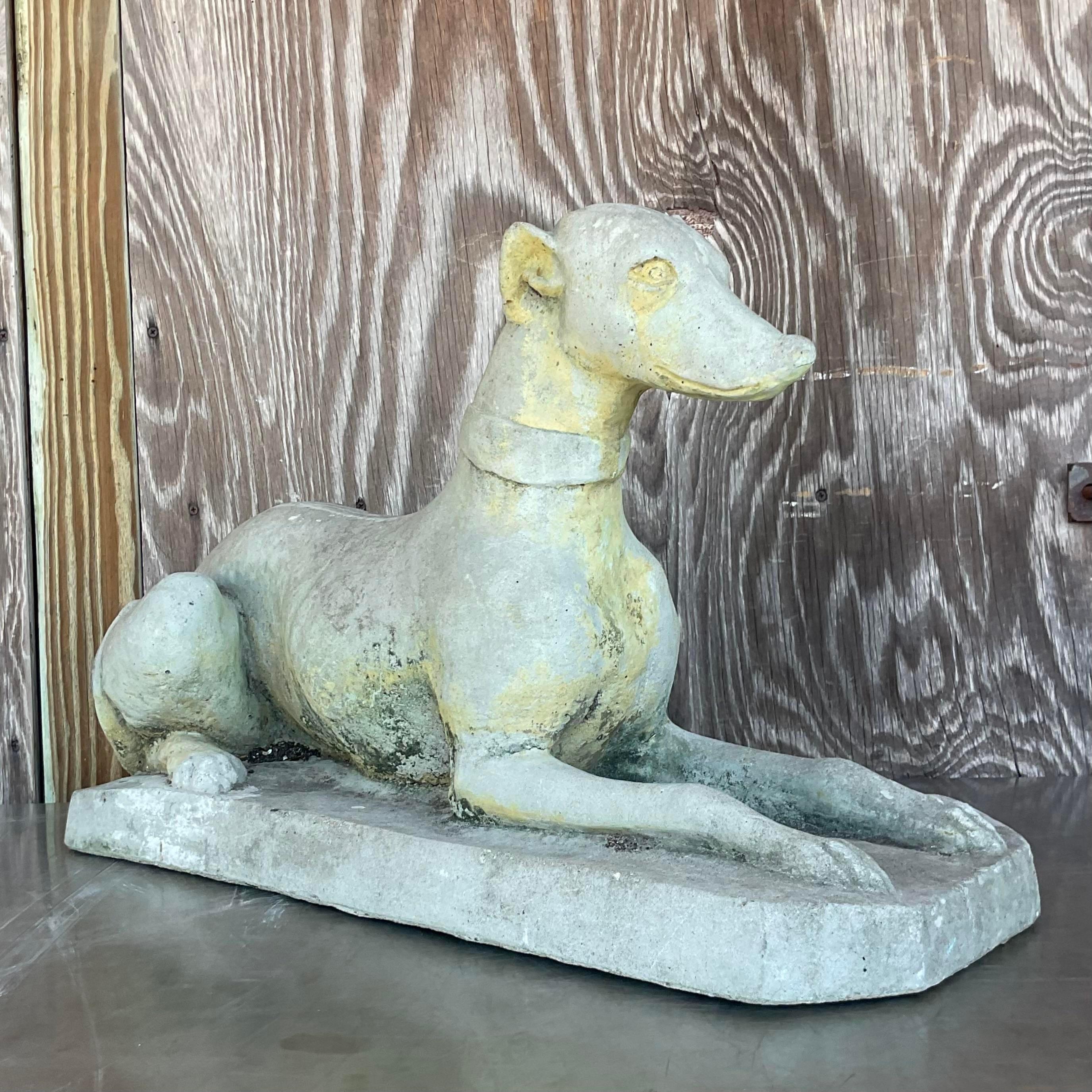 Embrace timeless elegance with our Vintage Regency Cast Cement Greyhound. This majestic piece exudes American sophistication, capturing the grace and poise of the iconic greyhound. Crafted with meticulous detail, it adds a touch of regal charm to
