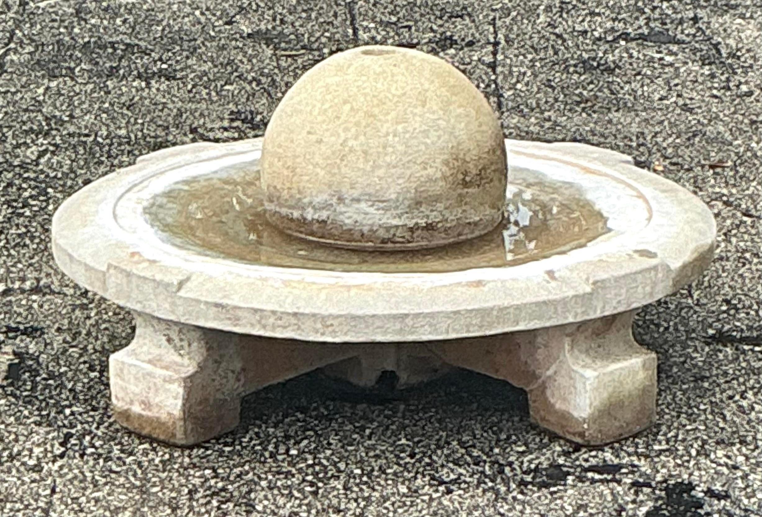 Create a timeless outdoor oasis with this Vintage Regency Cast Concrete Low Sphere Fountain. Featuring a beautifully crafted concrete sphere at its center, this fountain embodies the elegance of Regency design with a touch of bohemian charm. The