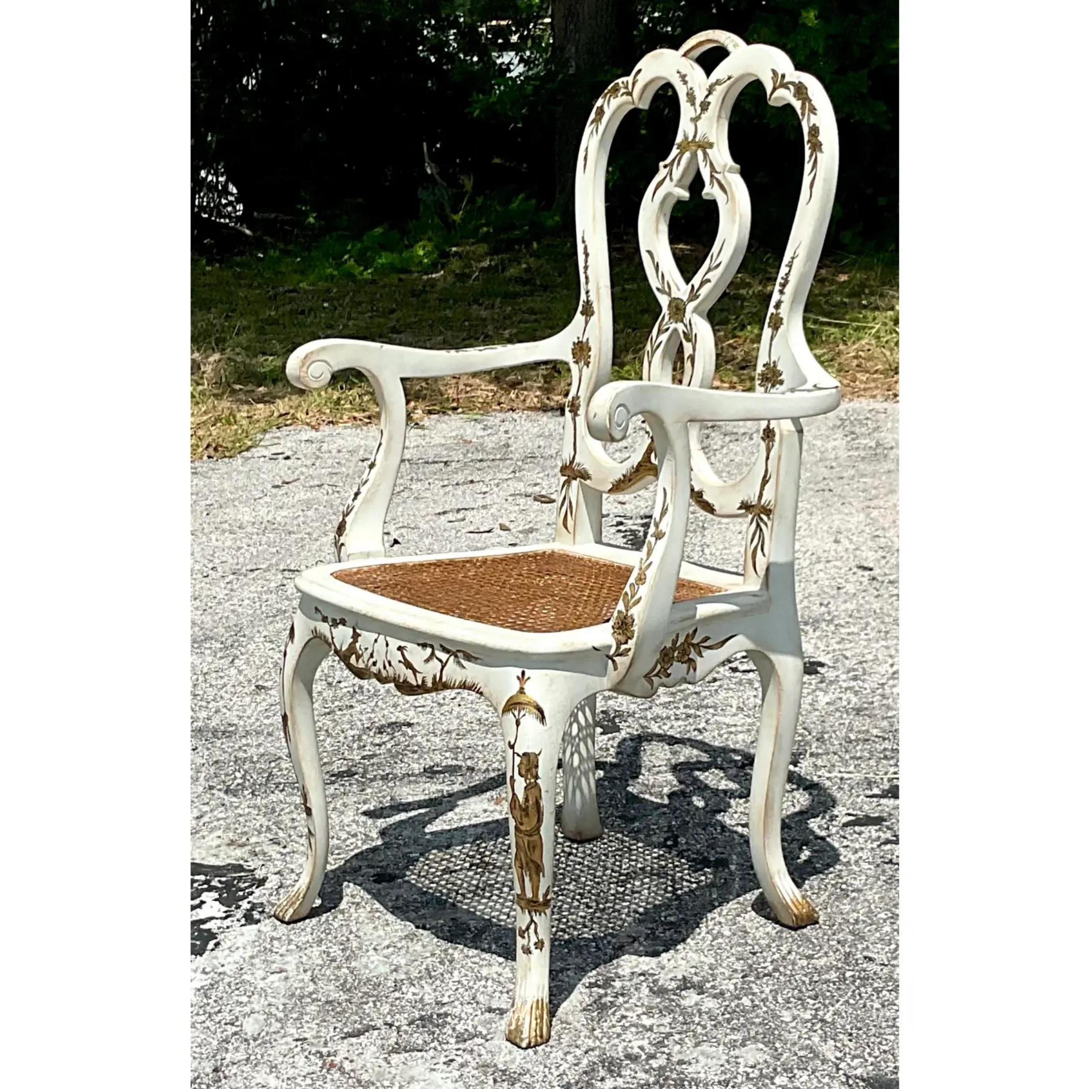 A fabulous vintage Regency arm chairs. A chic Chippendale frame with hand painted Chinoiserie Seat. Inset cane seat. Perfect as a desk chair or just gorgeous additional seating. Acquired from a Palm Beach estate. 
