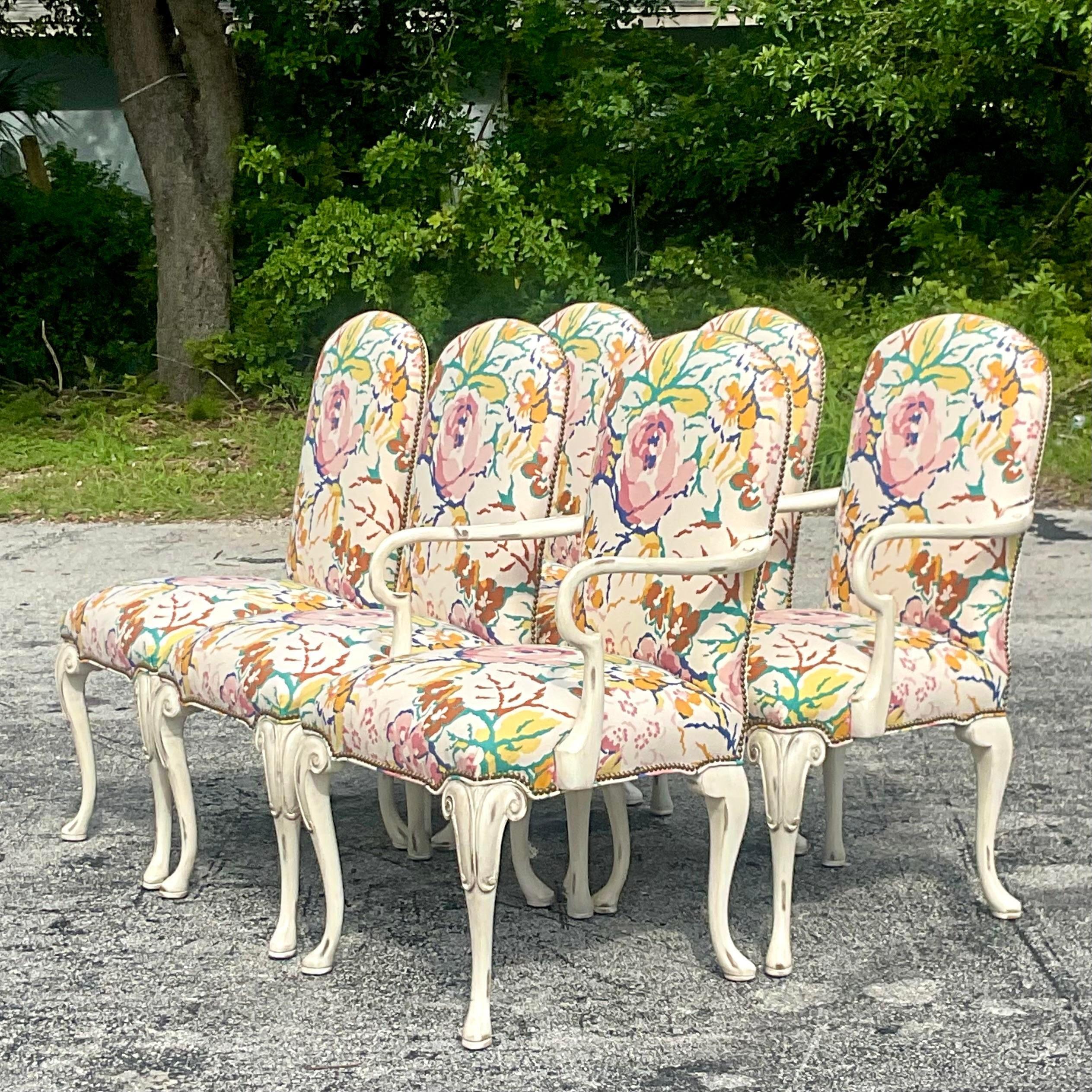 A stunning set of six vintage Regency dining chairs. Made by the iconic Councill group and marked on the bottom. A beautiful floral fabric in bright clear colors. Coordinating Cabana stripe on the back. Acquired from a Palm Beach estate.

armchair