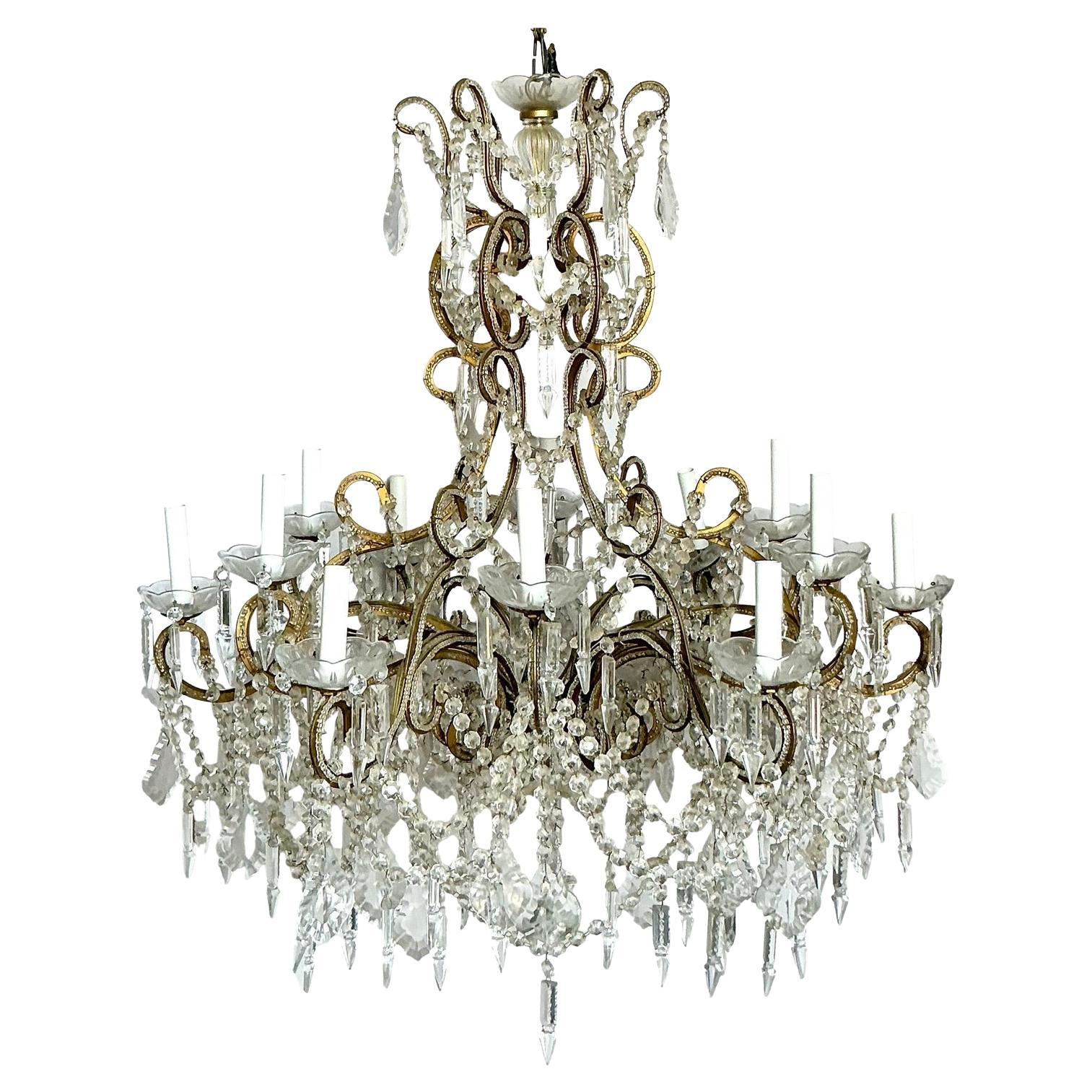 Lampadario a bracci di cristallo Regency d
epoca