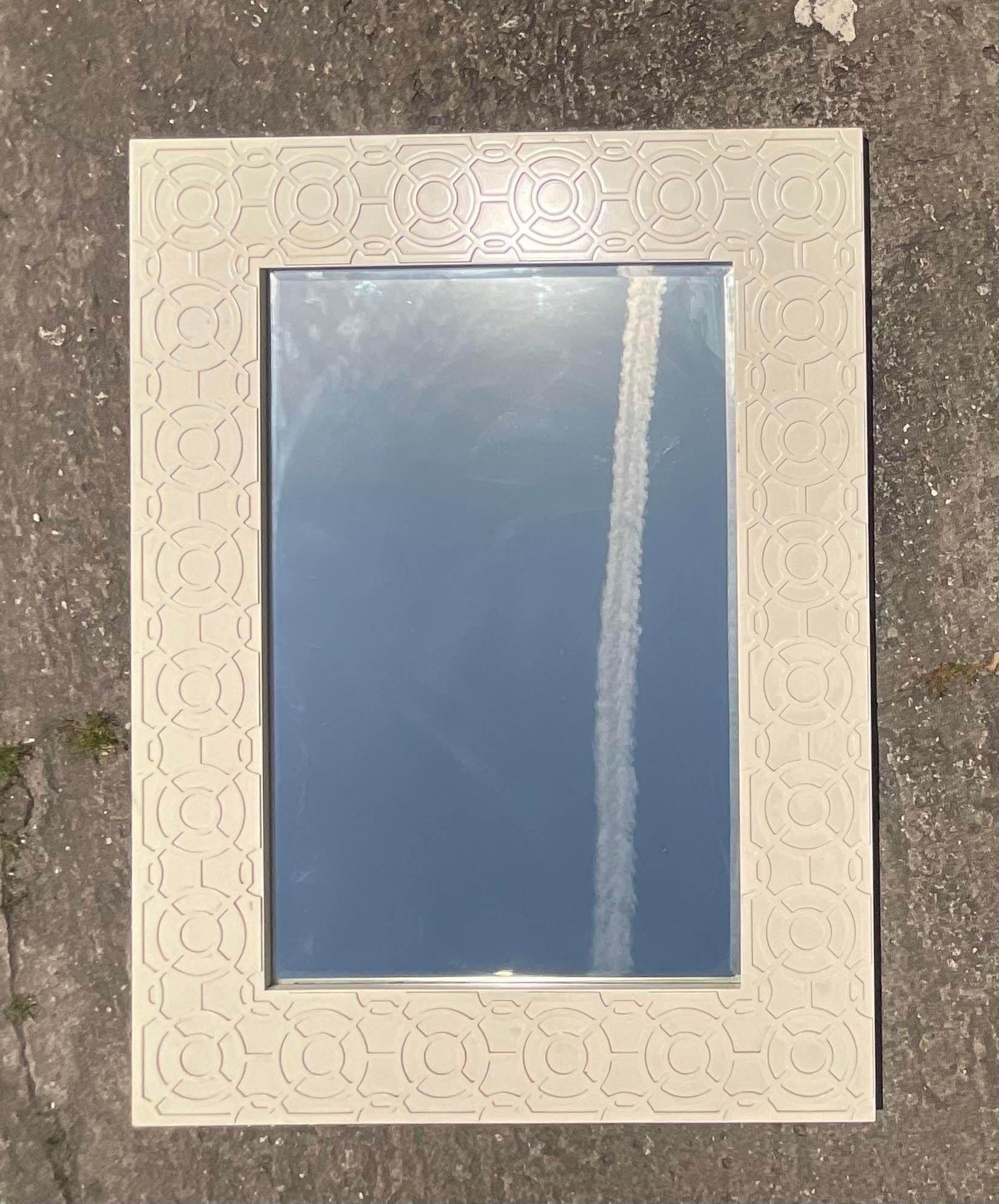 Embrace classic elegance with our Vintage Regency Currey and Company Fret Work Mirror. American-crafted by Currey and Company, this mirror showcases intricate fretwork detailing, blending timeless Regency style with artisan craftsmanship for a