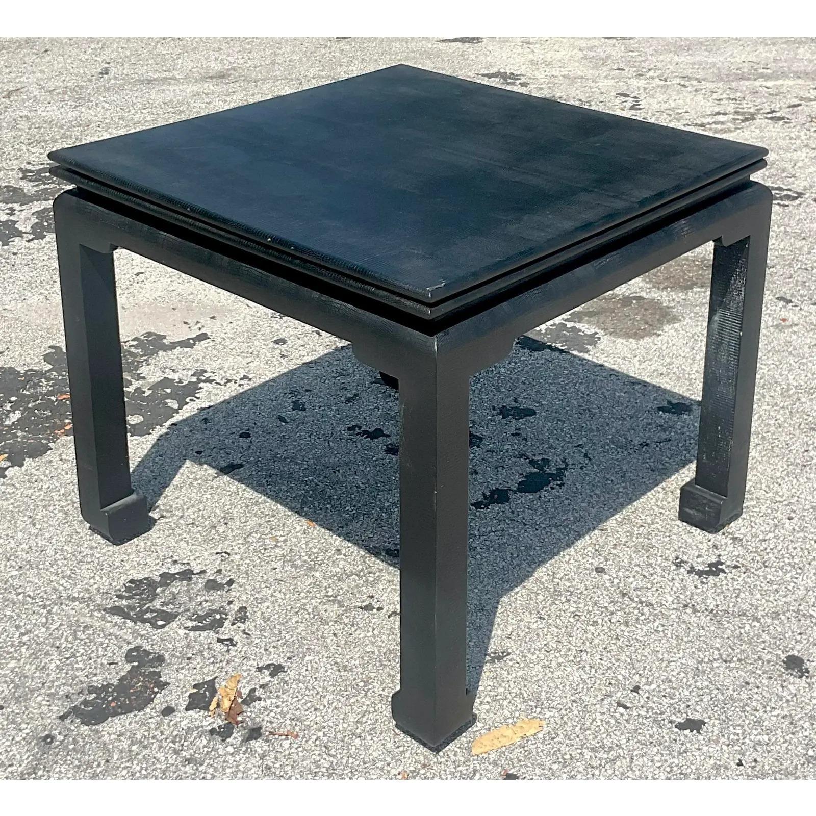 A fabulous vintage Regency Ming legs Game table. A chic embossed python in a deep black color. Opens up to a full size dining table. Slide easily on a track. Acquired from a Palm Beach estate.

Open table width 70.75
