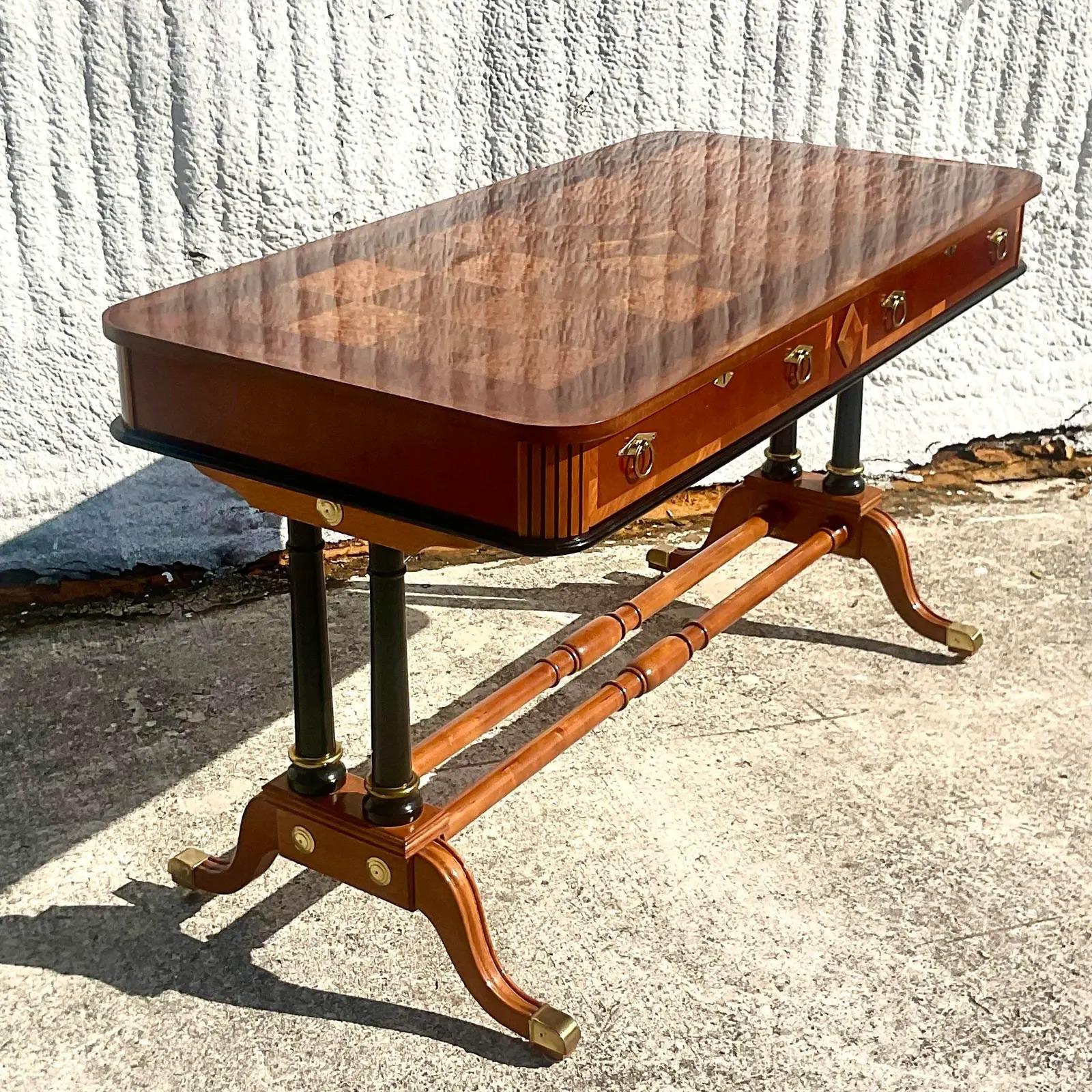 Vintage Regency empire writing desk. Beautiful marquetry top with beautiful wood grain detail. Acquired from a Palm Beach estate.
