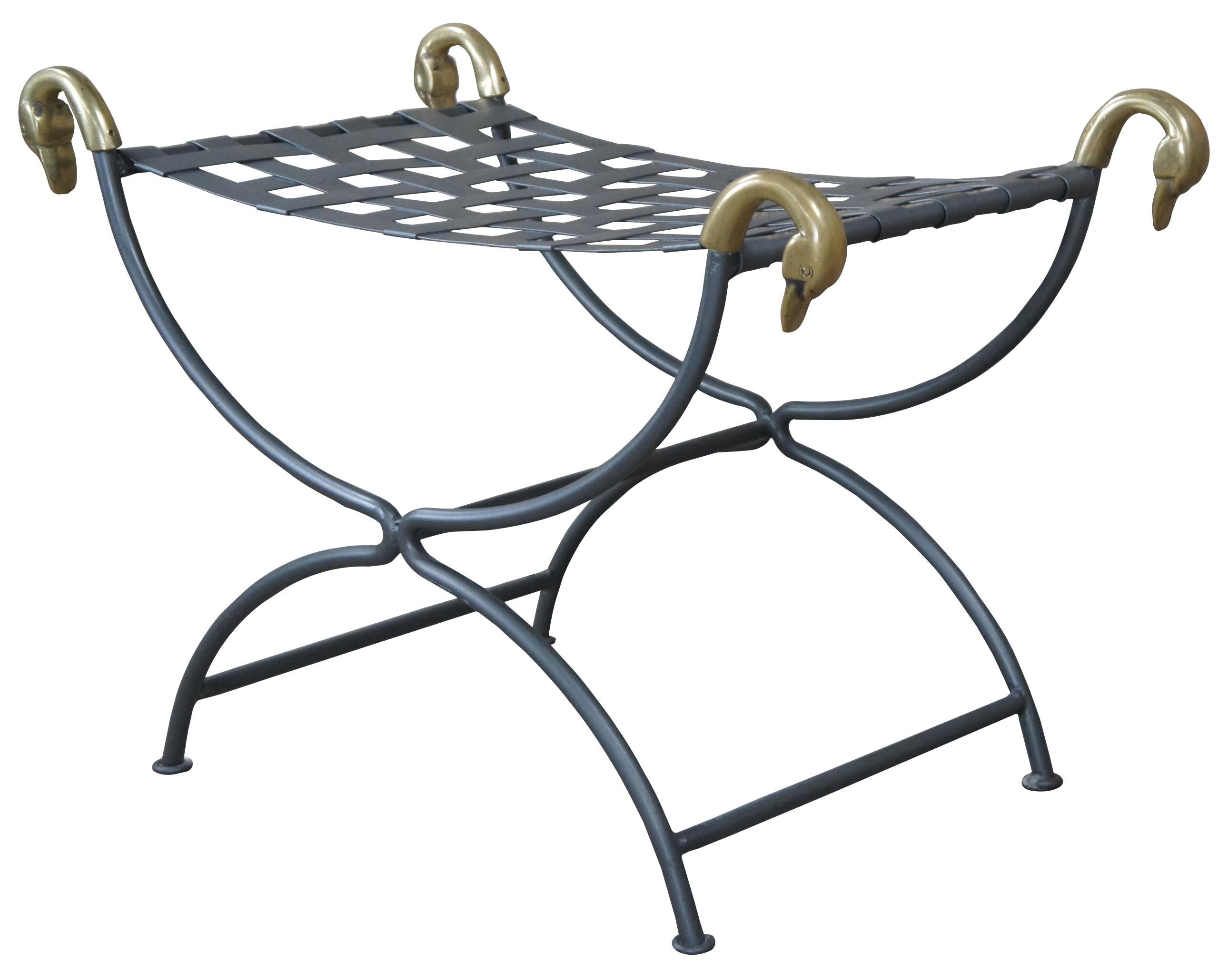 A beautiful iron curule bench stylized after Maison Janse, circa 1970s. Features a woven metal seat and figural brass swan heads.