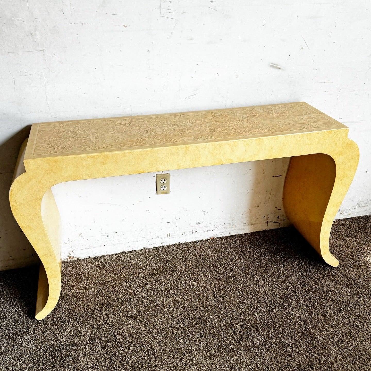 Discover the Vintage Regency Faux Goatskin Console with graphite lacquered finish, offering timeless appeal for your living space.
 
 Some wear to the finish as shown in the photos on the top and sides.
 
 We sell items as acquired, without
