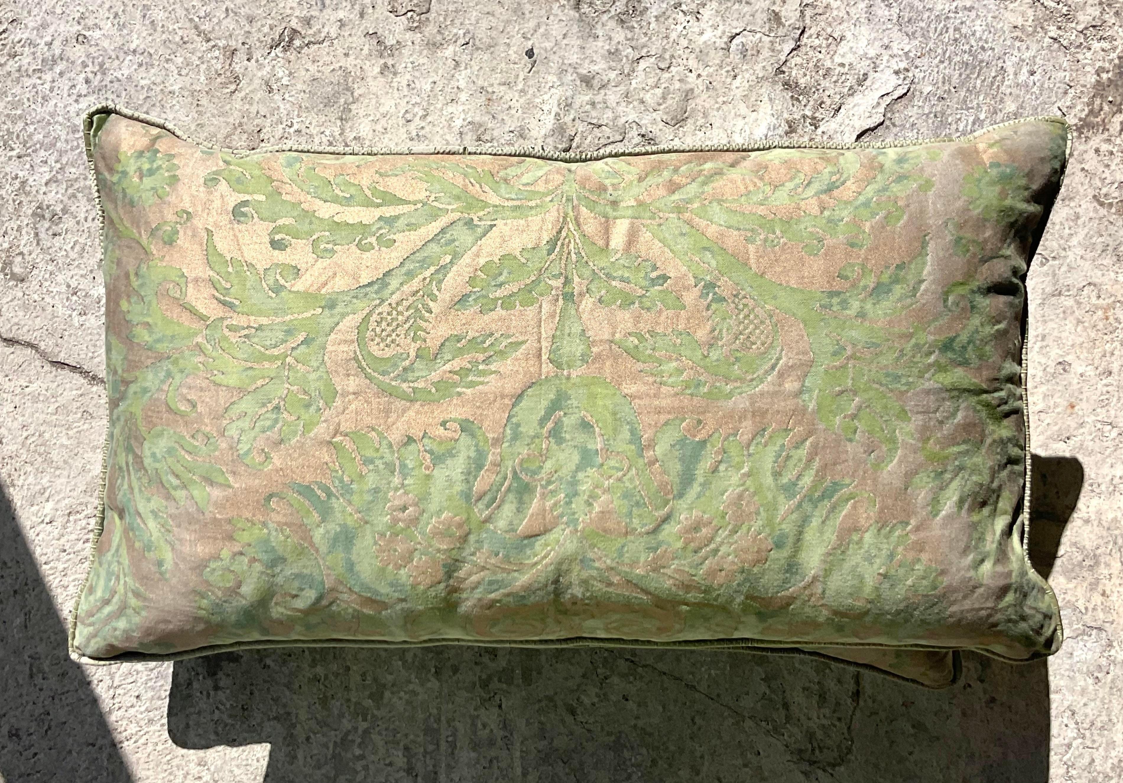 A fabulous pair of vintage Regency throw pillows. Made with the iconic Fortuny flier de lys brocade. Acquired from a Palm Beach estate.