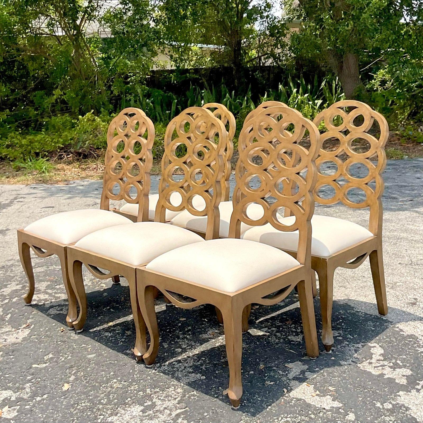 Elevate your dining experience with this set of 6 Vintage Regency Frances Elkins Loop Dining Chairs. These chairs blend classic Regency elegance with Frances Elkins' iconic loop design, offering timeless sophistication and comfort for your dining