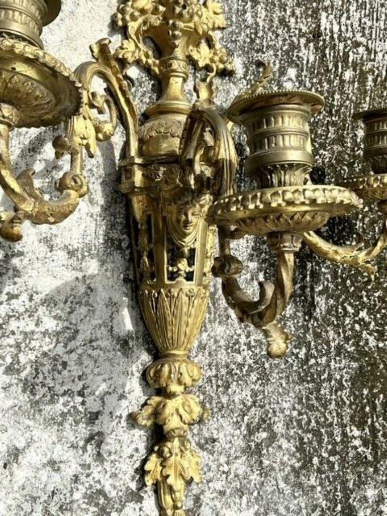 Pareja de candelabros dorados de la época de la Regencia siglo XX en venta