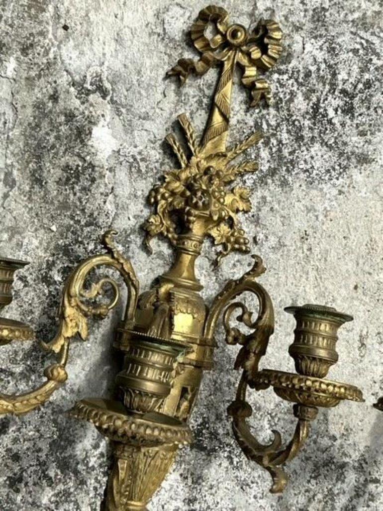 Pareja de candelabros dorados de la época de la Regencia Metal en venta