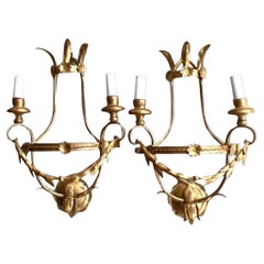 Pareja de candelabros dorados de estilo regencia vintage