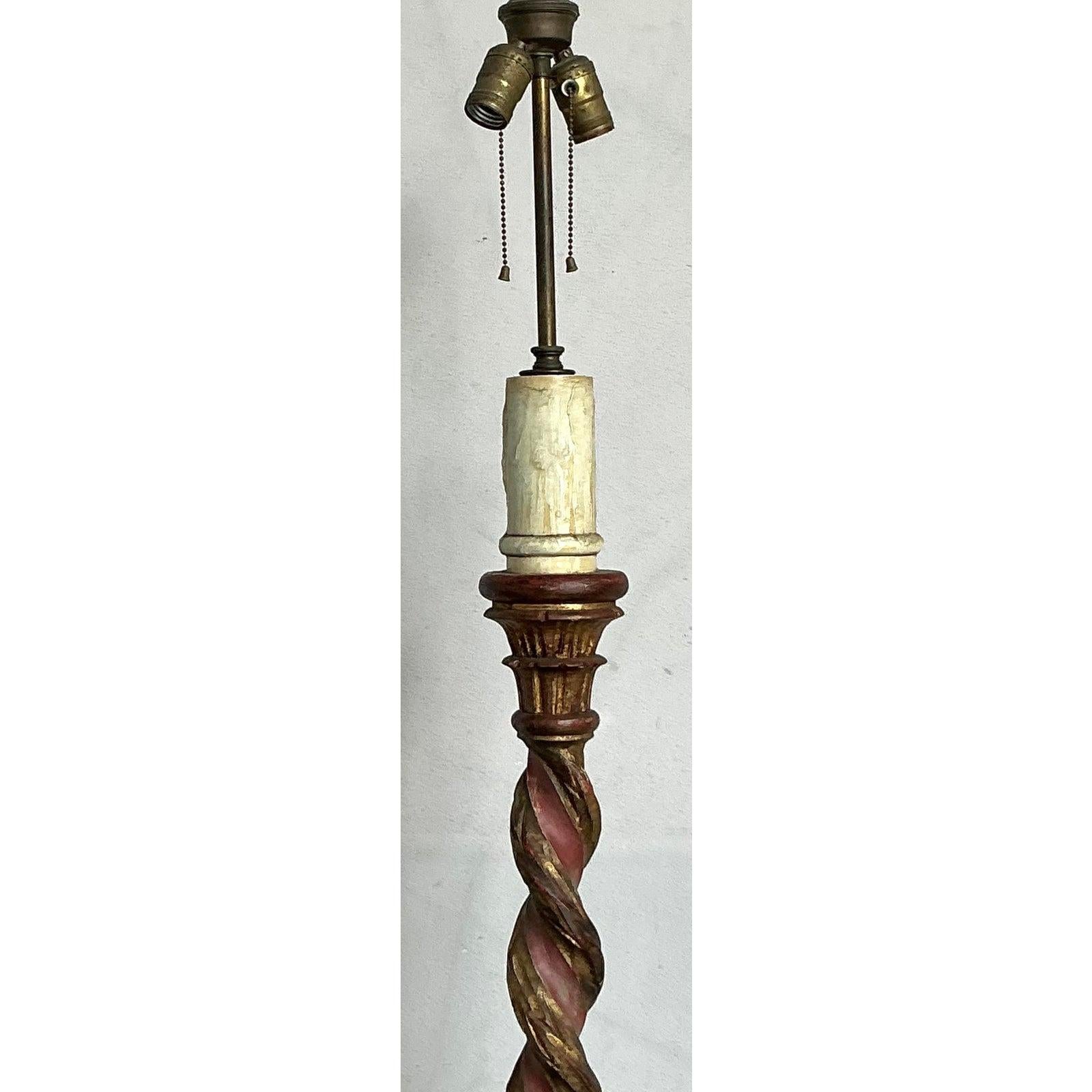 Introduce a touch of old-world charm and opulent design with this exquisite vintage floor lamp, showcasing a classic barley twist column detailed with elegant gilt tipping. This piece embodies the refined aesthetic of the Hollywood Regency era,