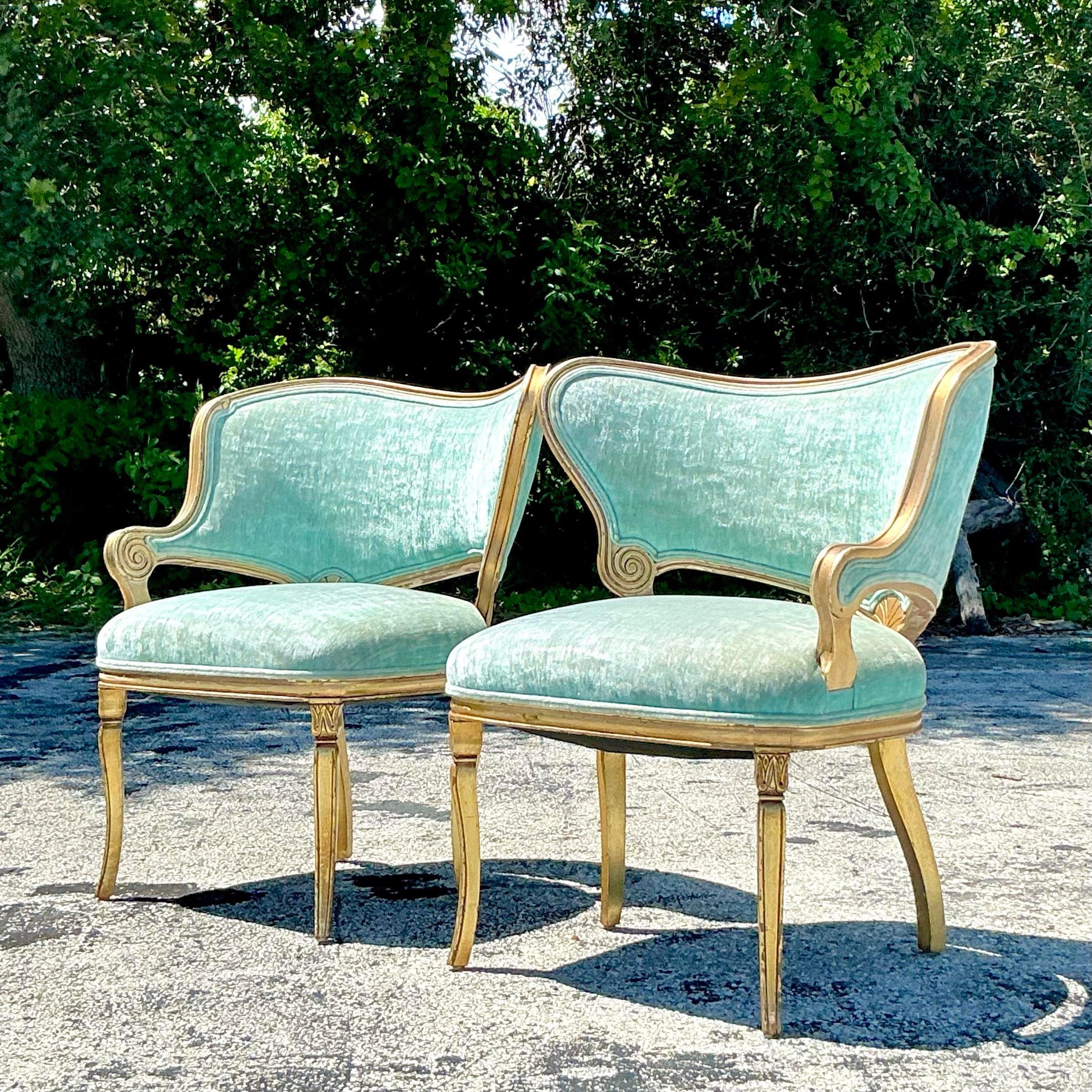 Add a touch of timeless elegance with this pair of vintage Regency scroll chairs, featuring luxurious gilt-tipped accents. The graceful scroll design and rich detailing exude classic sophistication, while the gilt tips provide a striking contrast.