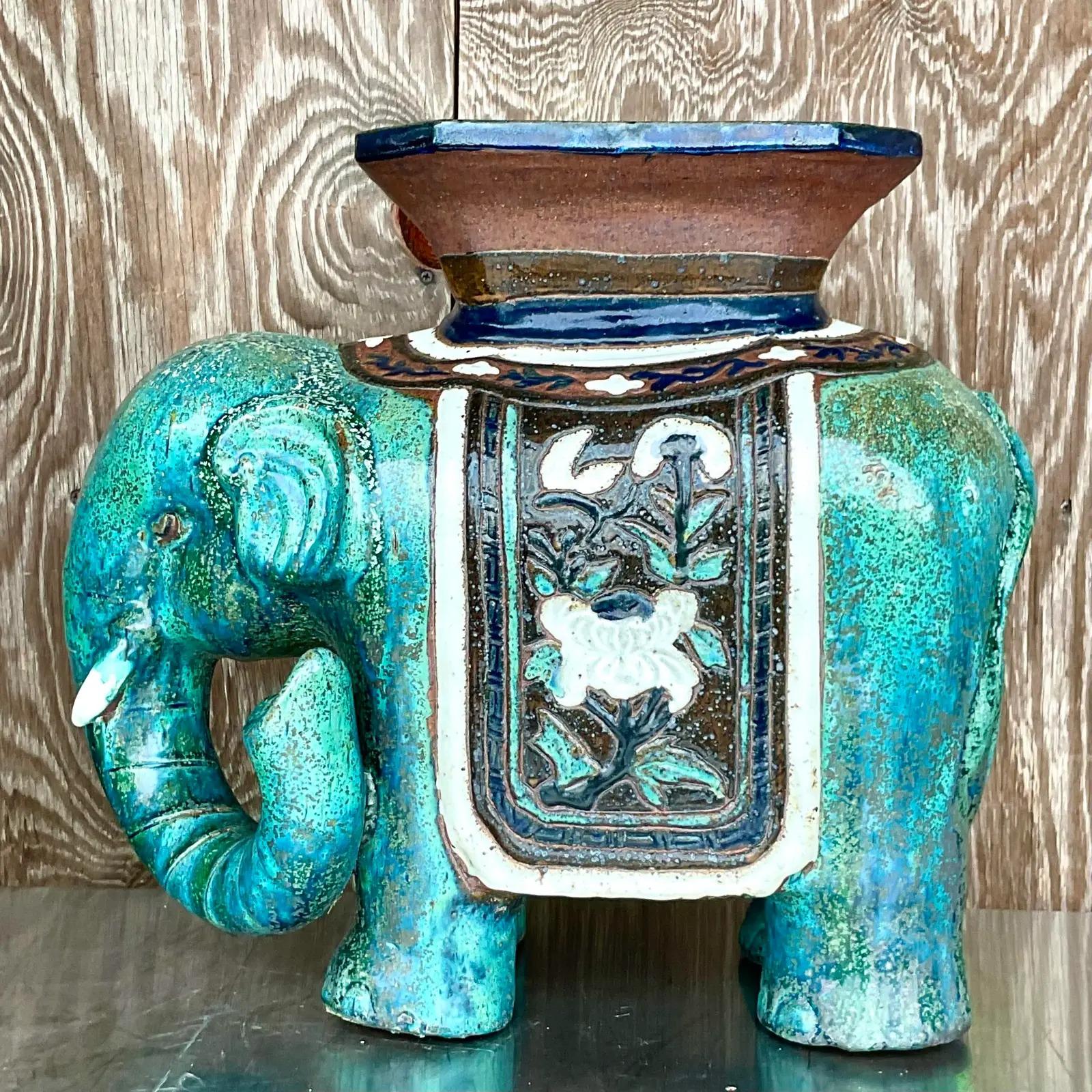 Fantastic vintage glazed ceramic elephant. Beautiful brilliant blue green tones with classic designs. Acquired from a Palm Beach estate.
