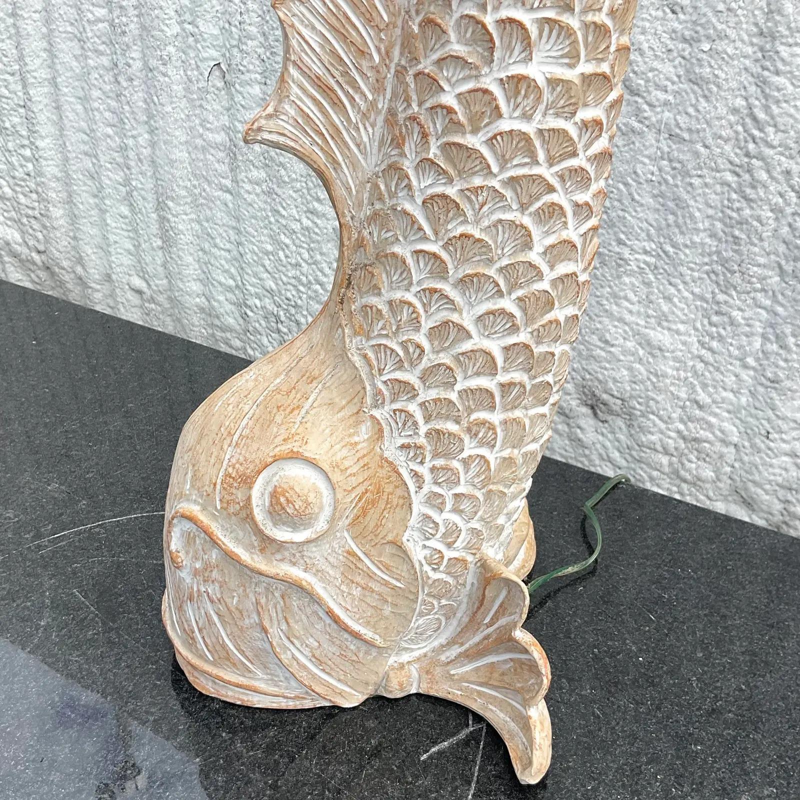 A fantastic vintage Coastal floor lamp. A beautiful hand carved Koi fish in a chic cerused finish. Acquired from a Palm Beach estate.