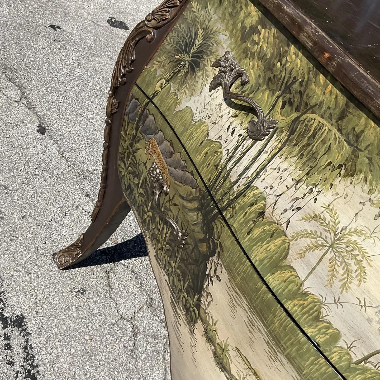 Fantastic vintage Regency Bombe chest of drawers. Beautiful hand painted safari scenes. Wide open plains with roaming animals. Acquired from a Palm Beach estate.