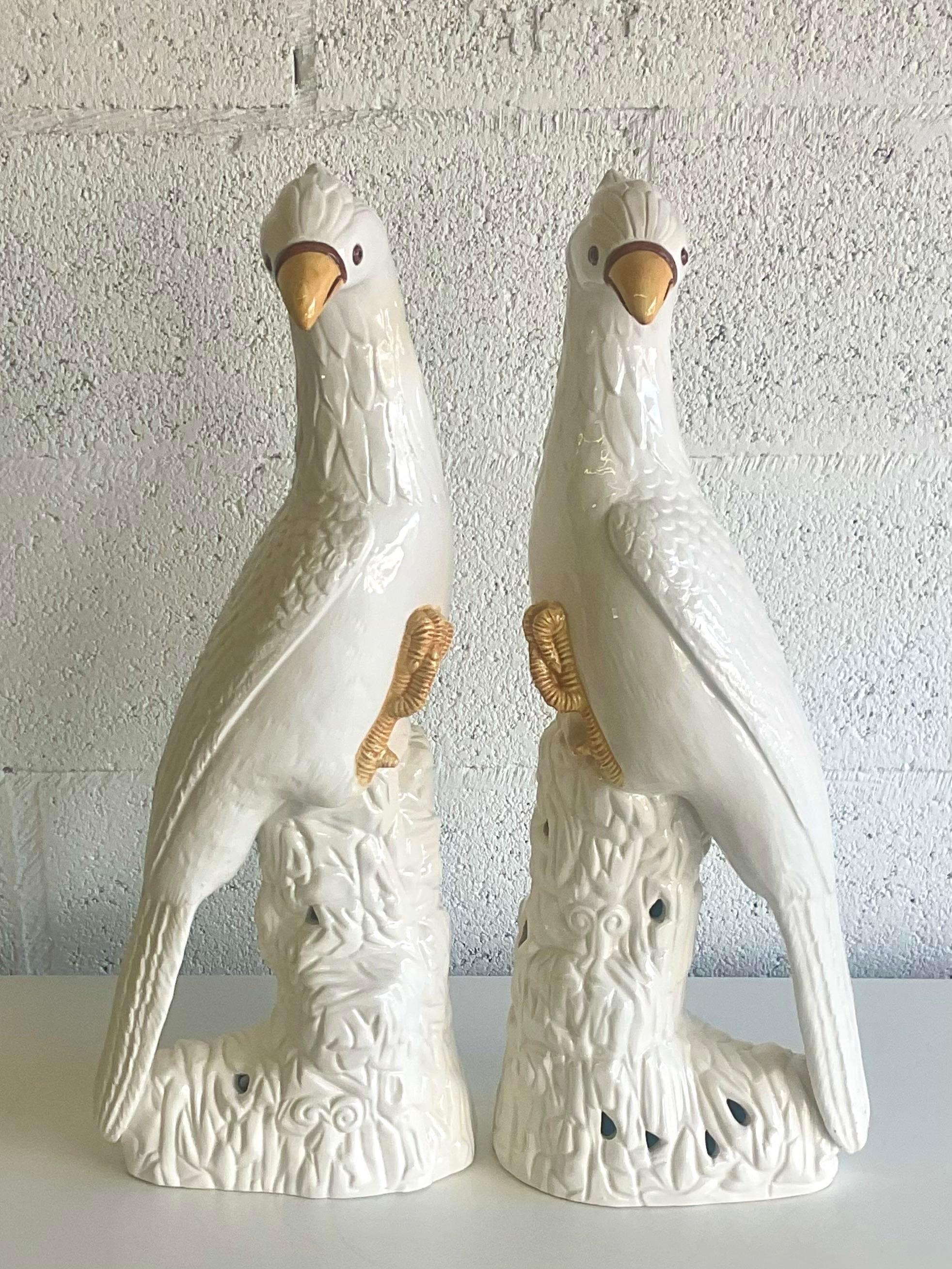 A fantastic pair of vintage cockatoo. Made in Italy. Beautiful glazed ceramic birds in regal poses. Marked on the bottom. Acquired from a Palm Beach estate. 