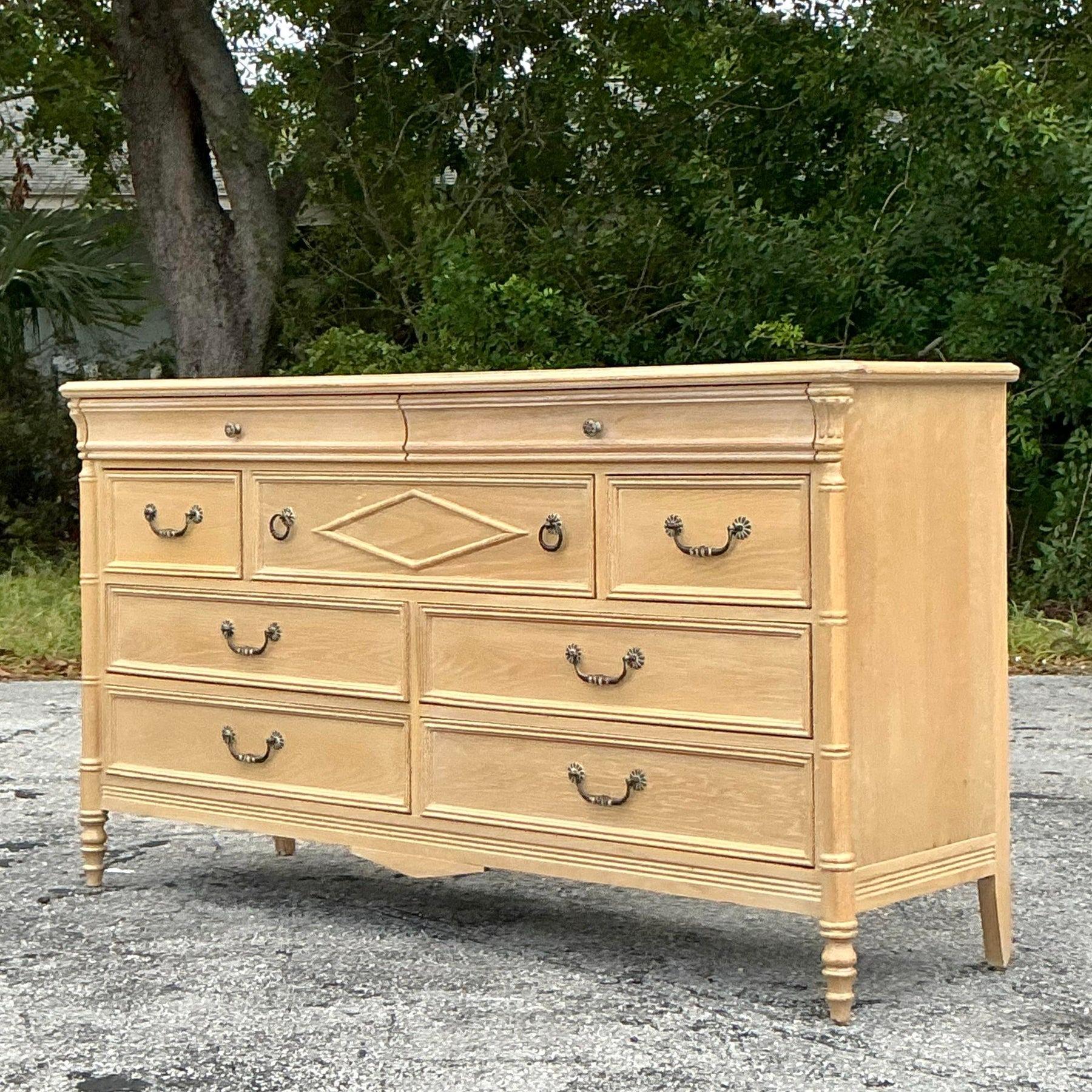 Vintage Regency Lexington Diamond dresser featuring timeless elegance and impeccable craftsmanship. This standout piece showcases a striking diamond-patterned front, complemented by a rich finish and refined hardware. Perfect for adding a touch of