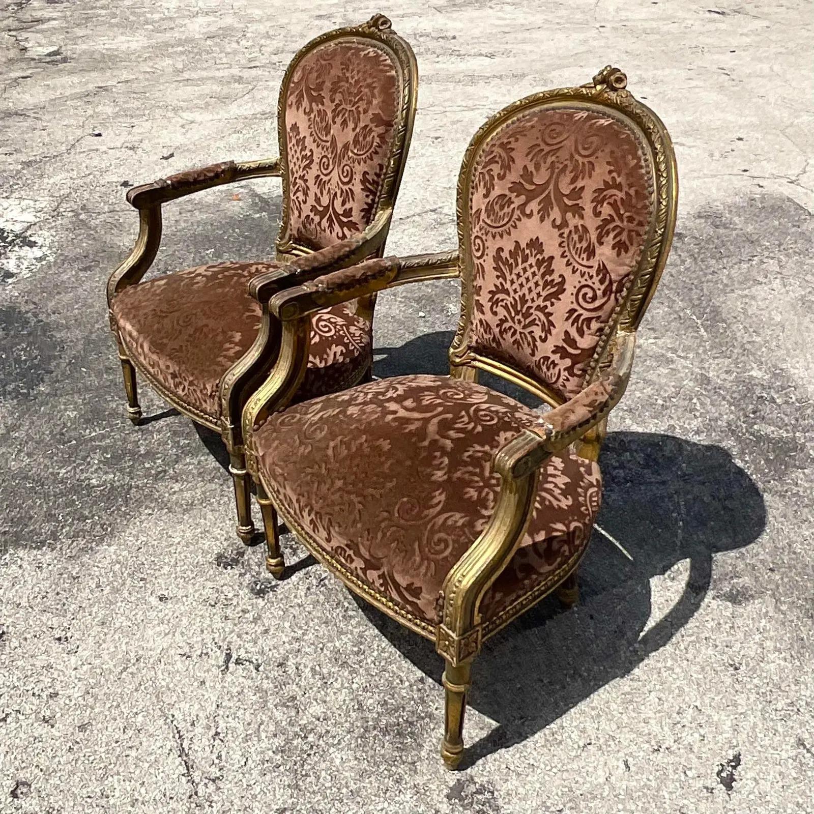 North American Vintage Regency Louie Gilt Bergere Chairs, a Pair