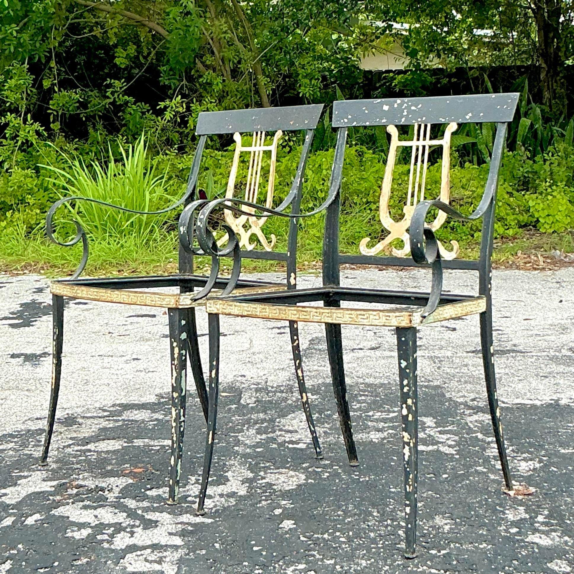 Add a touch of classic elegance to your seating with Vintage Regency Lyre Back Wrought Iron Chairs. These stunning pieces feature intricate lyre back designs and durable wrought iron construction, perfect for elevating any indoor or outdoor space