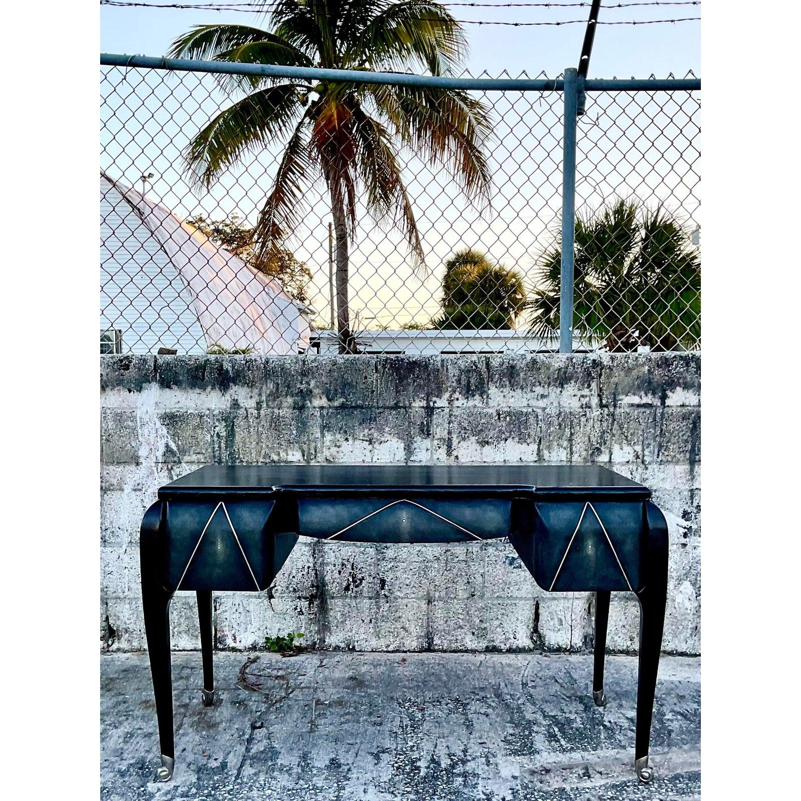 Incredible vintage Maitland Smith writing desk. Stunning shagreen sides with strips of polished chrome. Beautiful crackle finish top and polished chrome feet. A truly spectacular piece of furniture. Acquired from a Palm Beach estate.