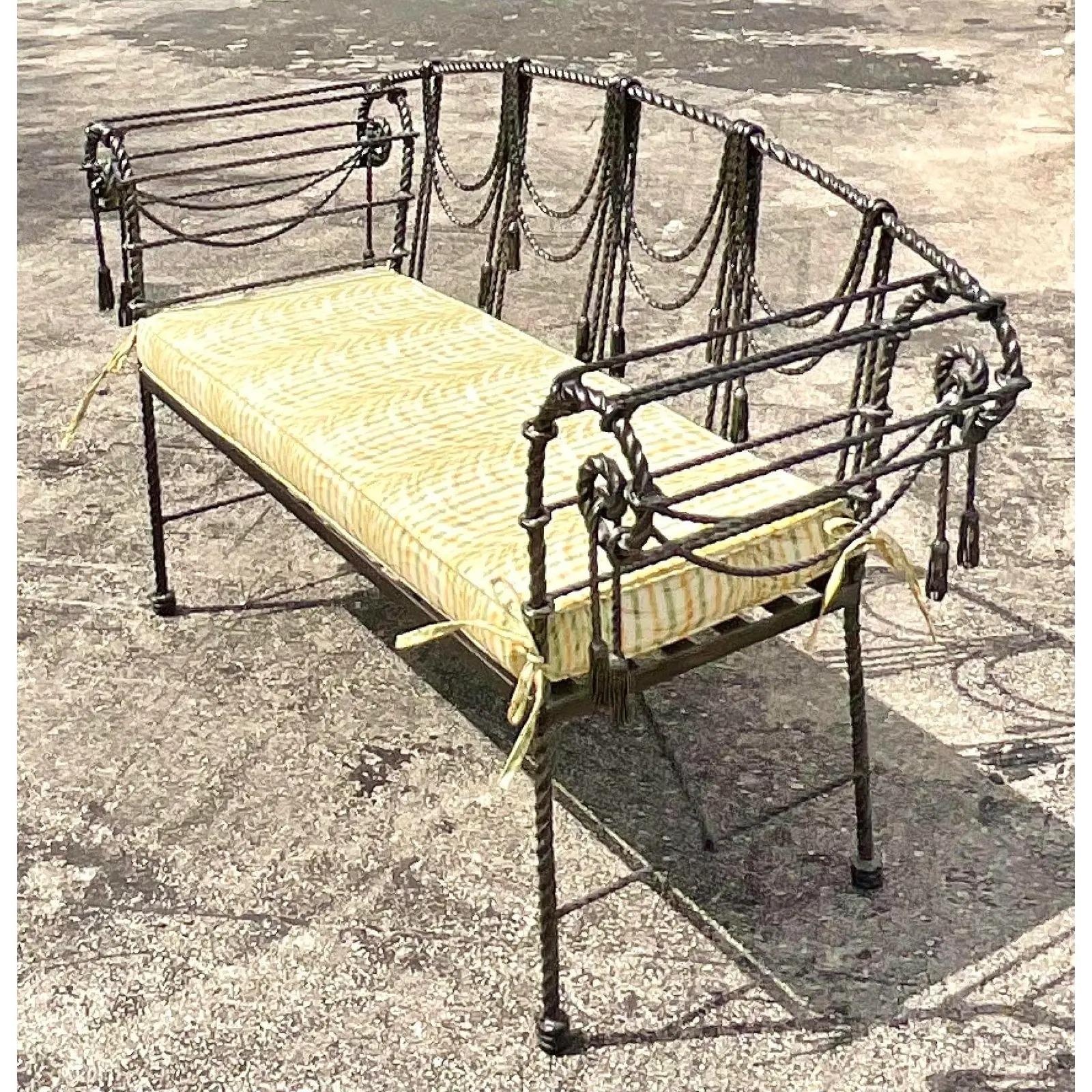 Incredible vintage Regency Swag and Tassel bench. Made by the iconic Maitland Smith group. Beautiful twisted wrought iron with charming rope detail. Stunning custom upholstered seat with a rushed printed cotton sateen. Acquired from a Palm Beach
