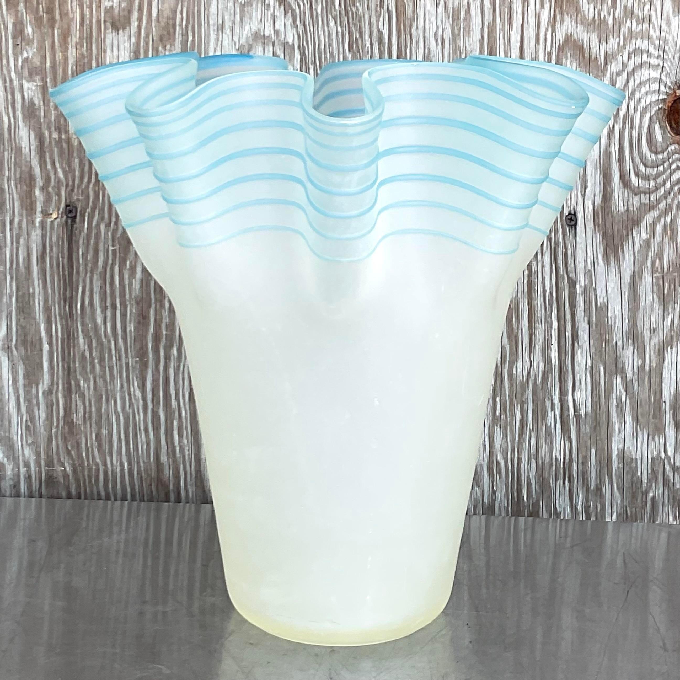 A chic and fantastic vintage Murano vase. Beautiful striped detail along a ruffle edge. Unmarked. Acquired from a Palm Beach estate. 