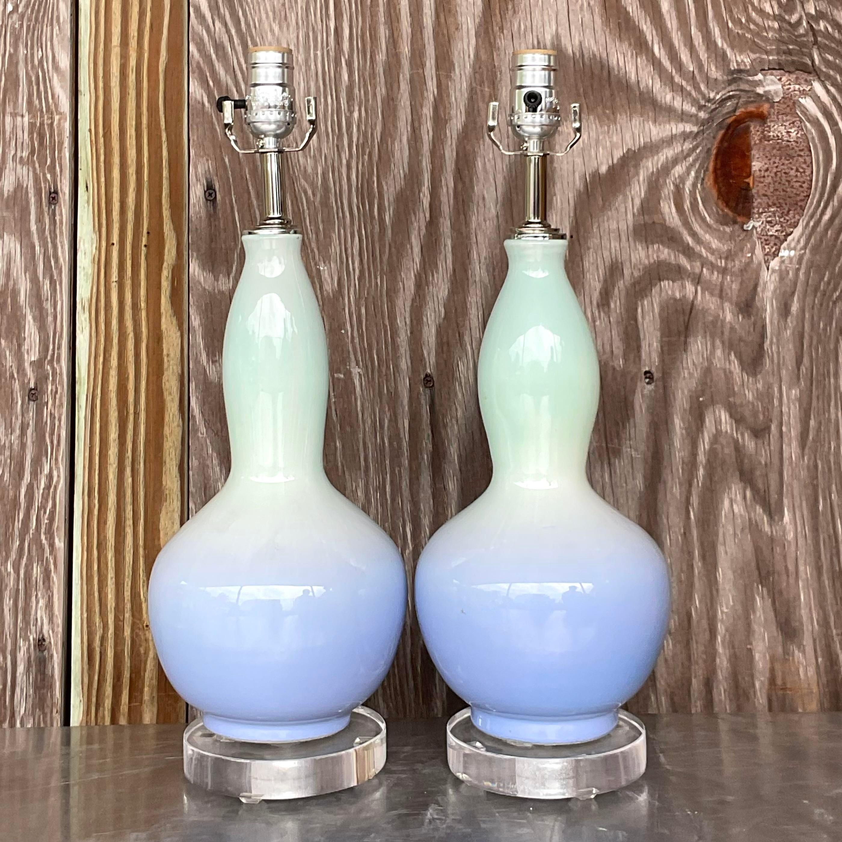 Regal Radiance: Vintage Regency Ombre Glass Lamps - A Pair. Illuminate your space with American elegance and timeless sophistication, featuring exquisite ombre glass design that adds a touch of regal charm to any room.