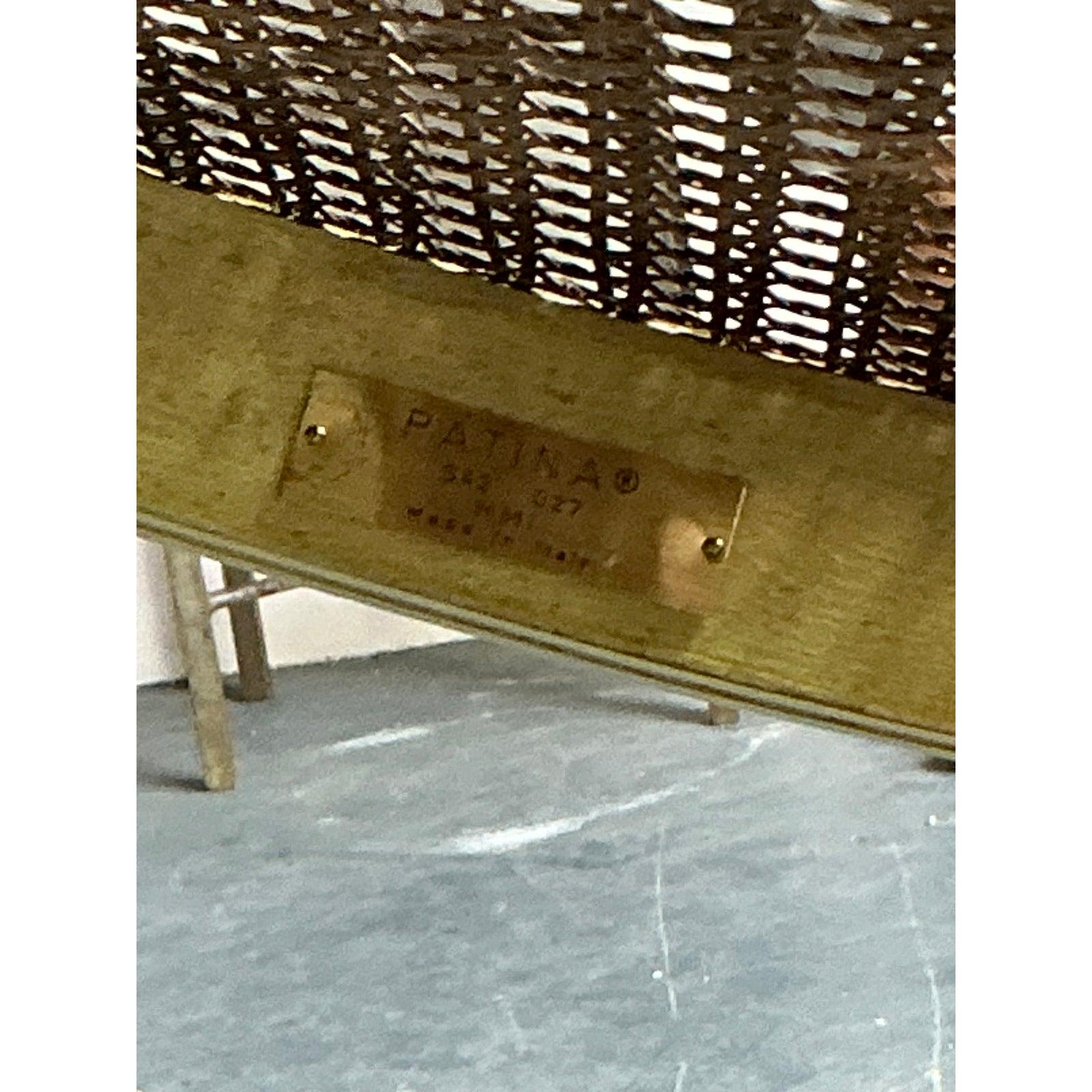 Exemplifying the timeless allure of Hollywood Regency design, this exquisite dining chair is a masterclass in Chinoiserie chic. The solid wood frame is artfully carved to resemble bamboo and is finished in a luminous gold gilt, creating an immediate