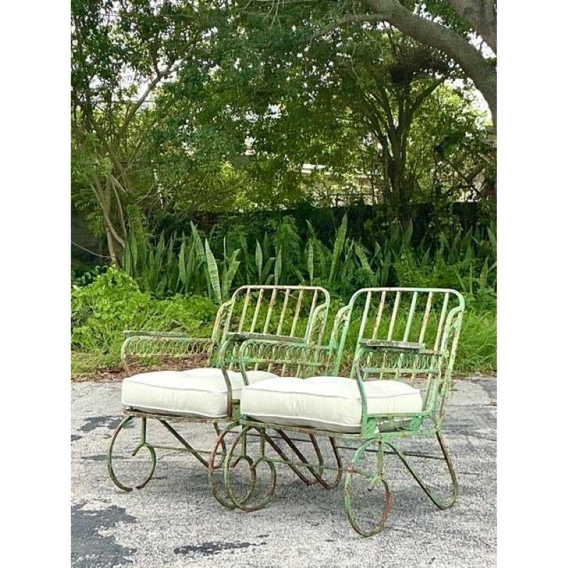 XX secolo Vintage Regency Patinated Wrought Iron Trellis Lounge Chairs - A Pair in vendita