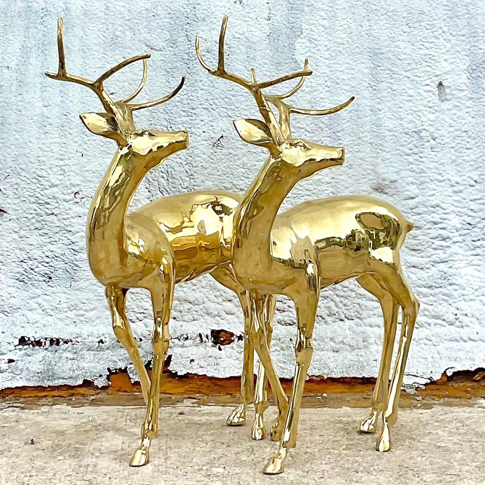 A spectacular pair of vintage Regency deer. A gorgeous high polished mirror finish. Monumental in size and drama. Acquired from a Palm Beach estate.