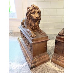 Vintage Regency Recumbent Lion Firedogs Plinth Base, a Pair