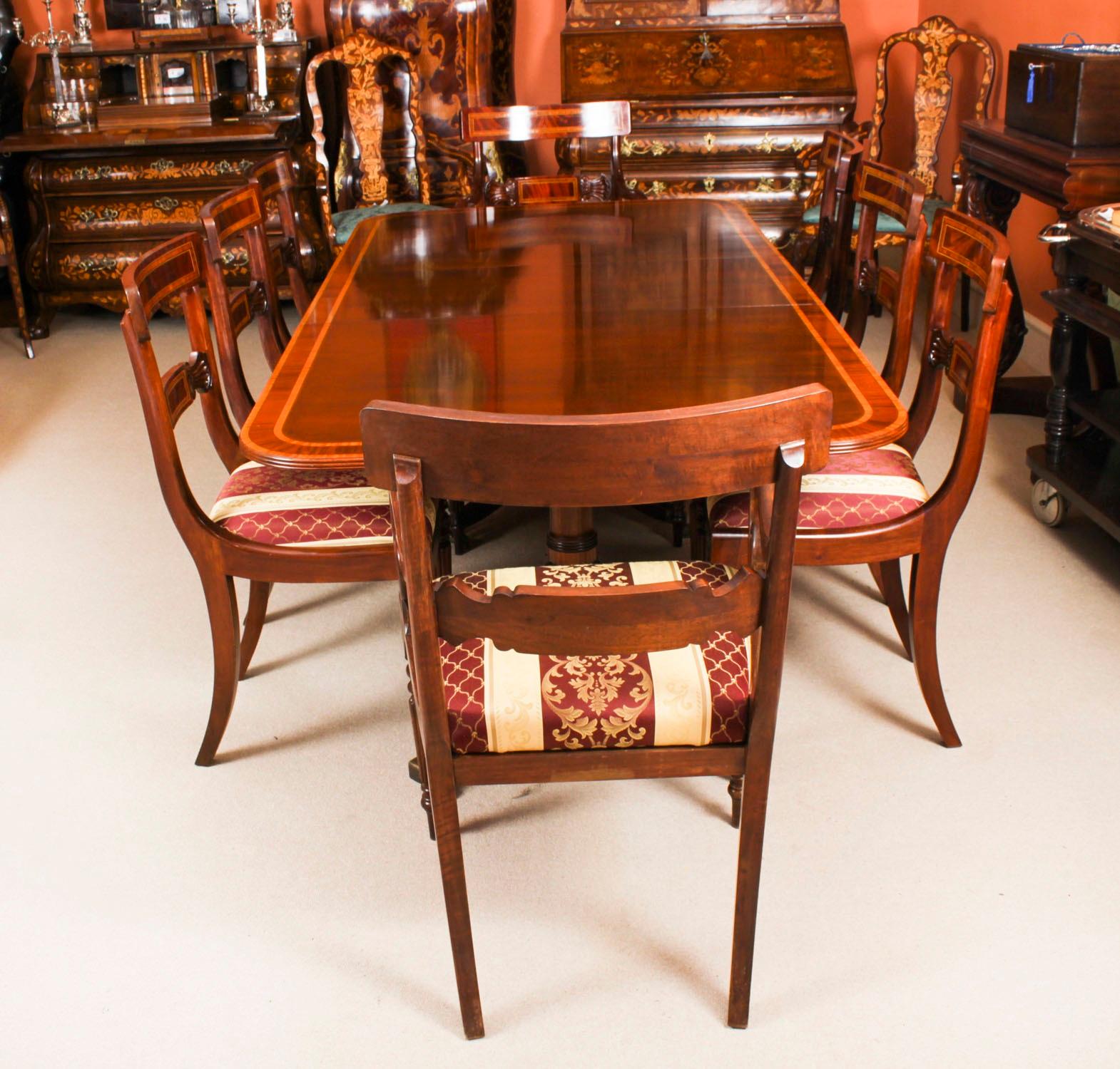 This fabulous Vintage Regency Revival  dining set comprising a dining table  by the master cabinet maker William Tillman, Circa 1980 in date and a set of eight matching dining chairs.

The table is made of stunning solid flame mahogany with
