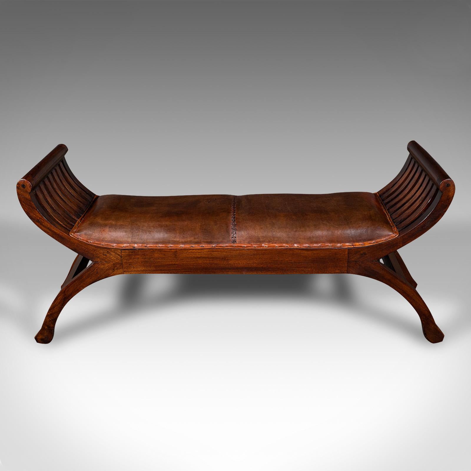 Our Stock # 24887

This is a vintage Regency revival window bench. An English, mahogany and leather duet stool or bedroom seat, dating to the late 20th century, circa 1970.

Striking form, with a delightful Regency revival taste
Displays a desirable